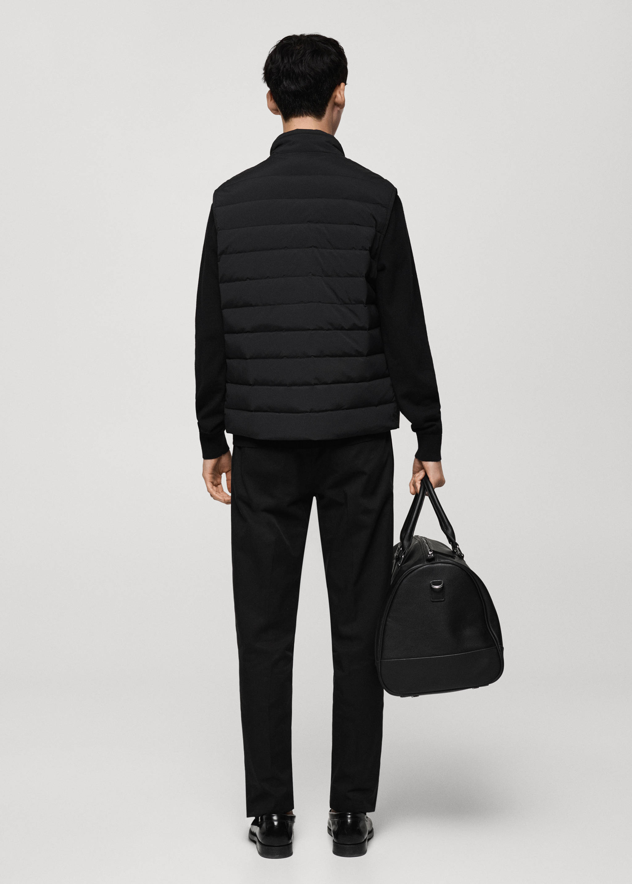 Colete acolchoado com enchimento de penas - Verso do artigo