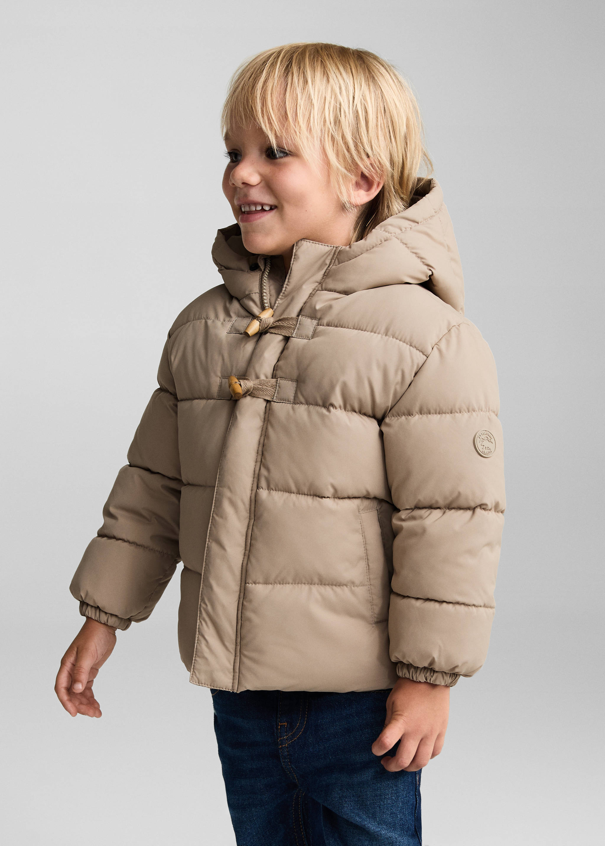 Anorak matelassée imitation mouton retourné - Plan moyen