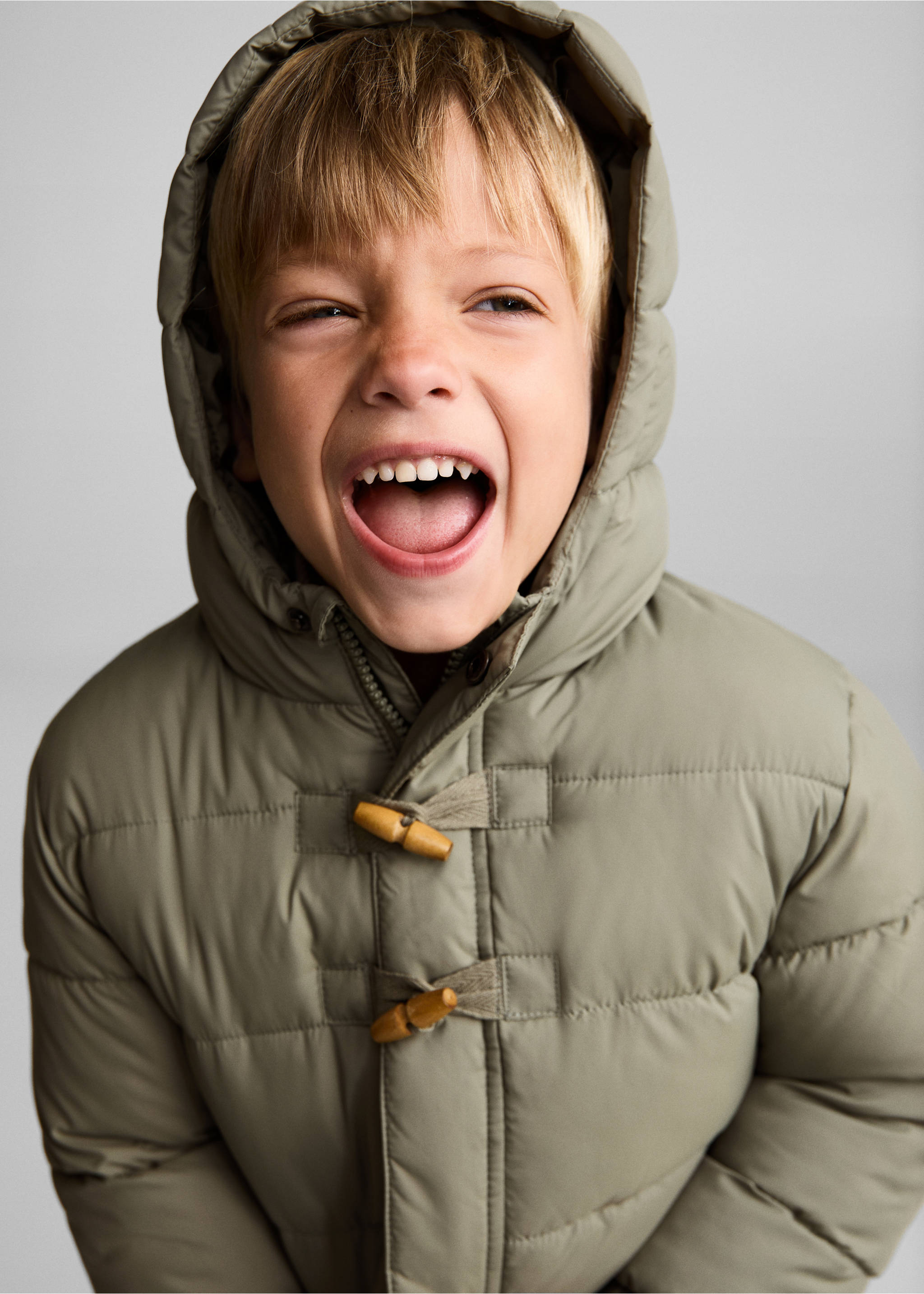 Padded anorak with shearling lining - Details of the article 1, Green. Ref: 77054436-00.