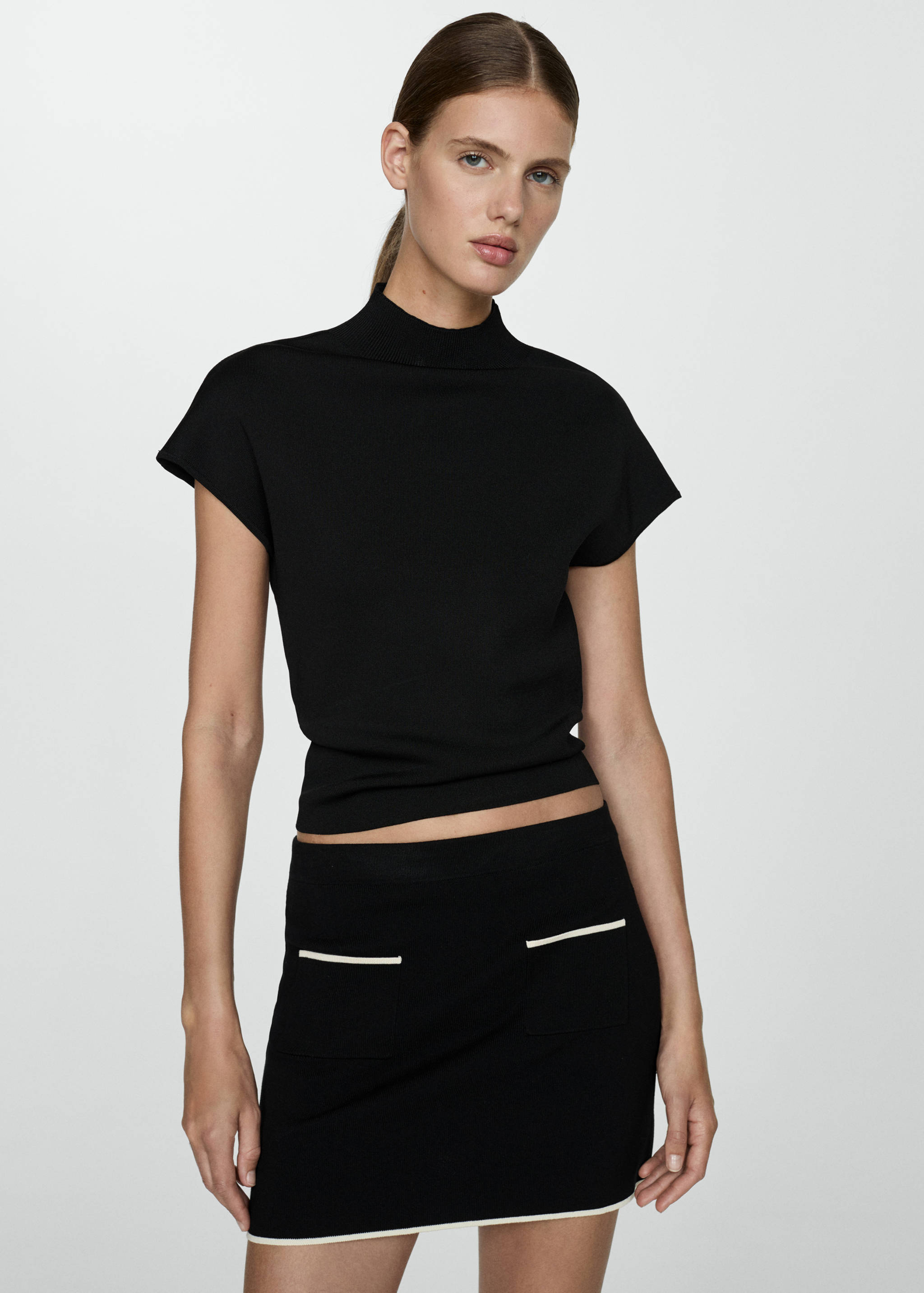 Knitted mini-skirt with pockets - Medium plane