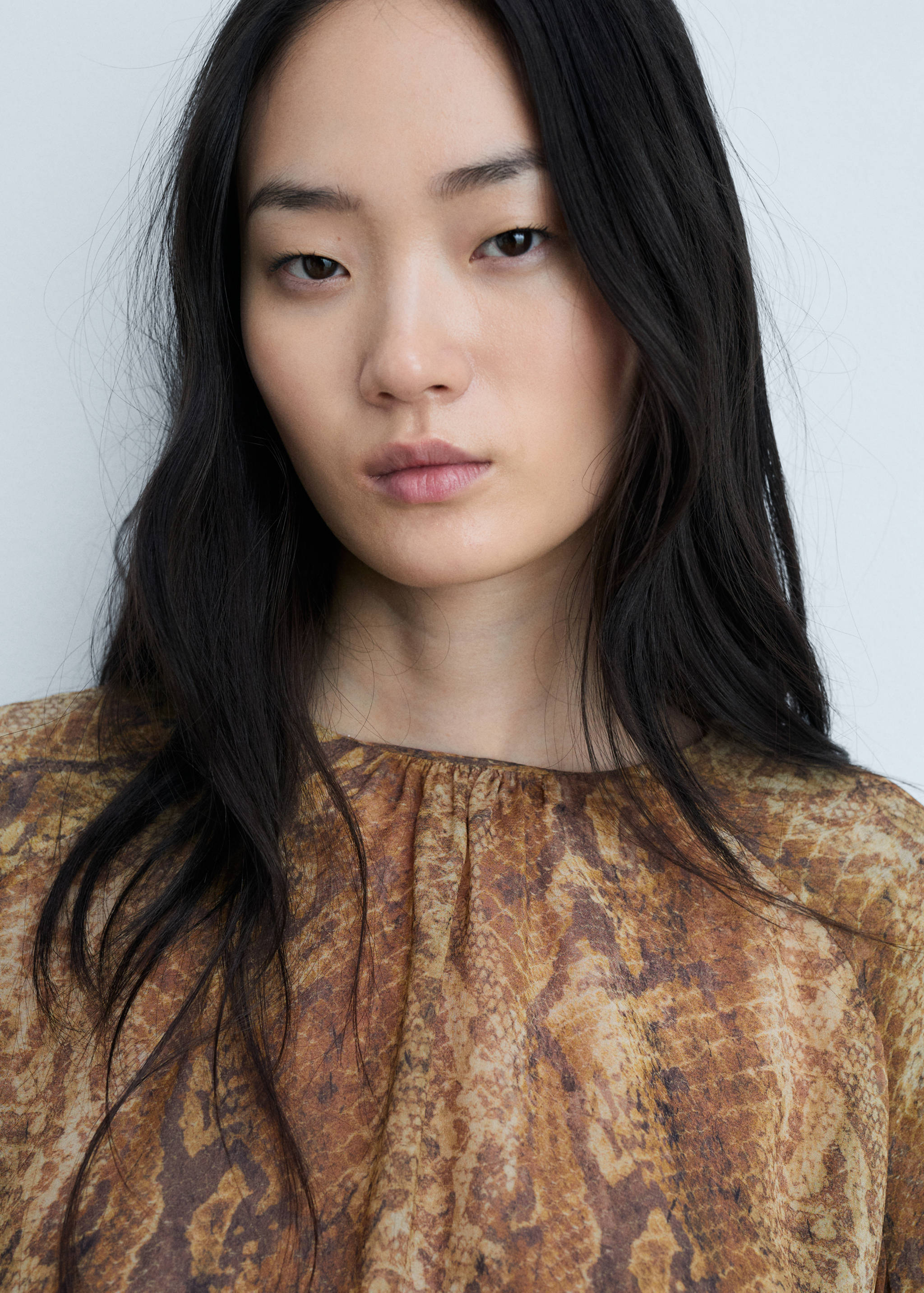 Ruffle blouse with snake print - Details of the article 1