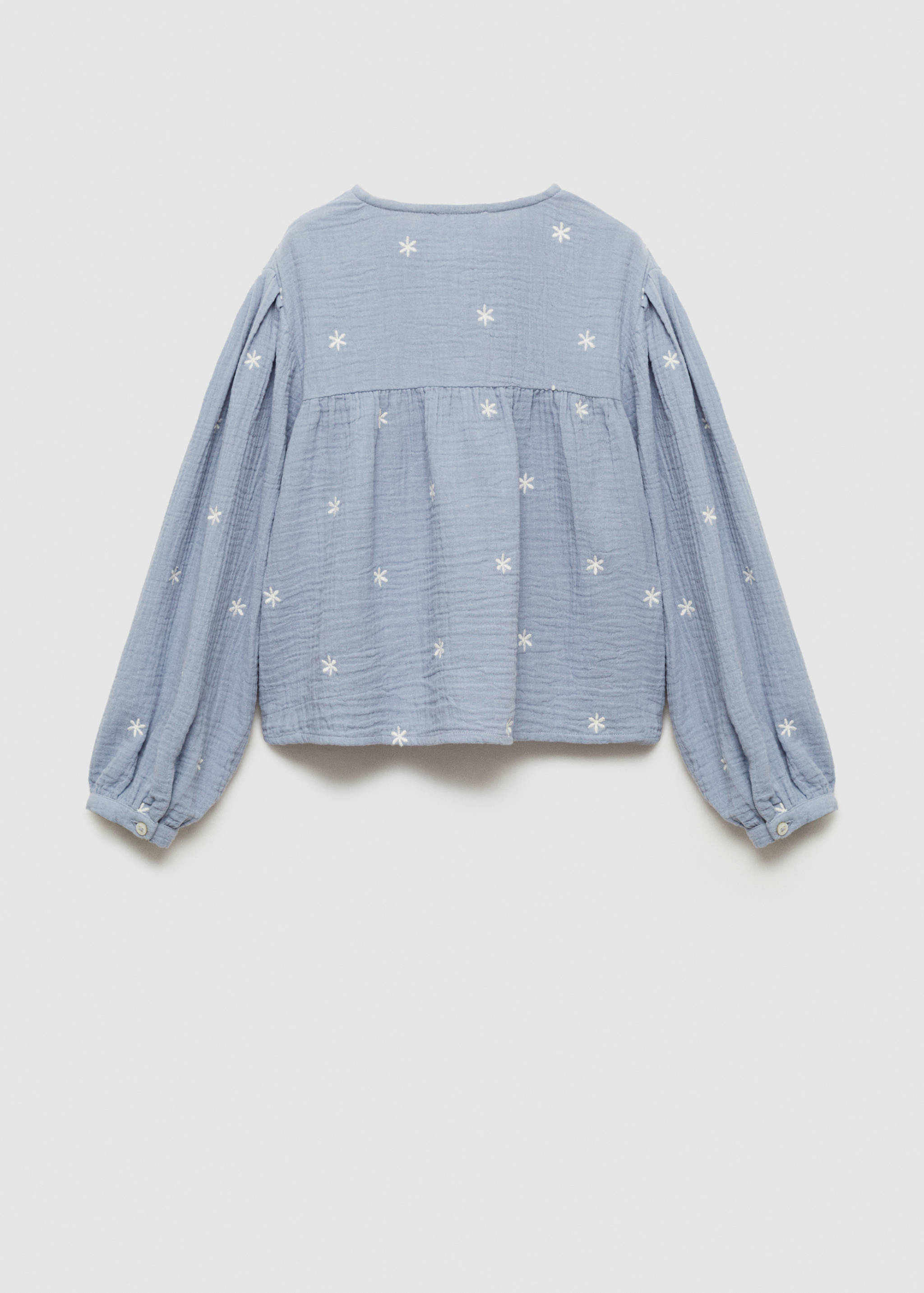 Brusa detalls brodats - Revers de l'article