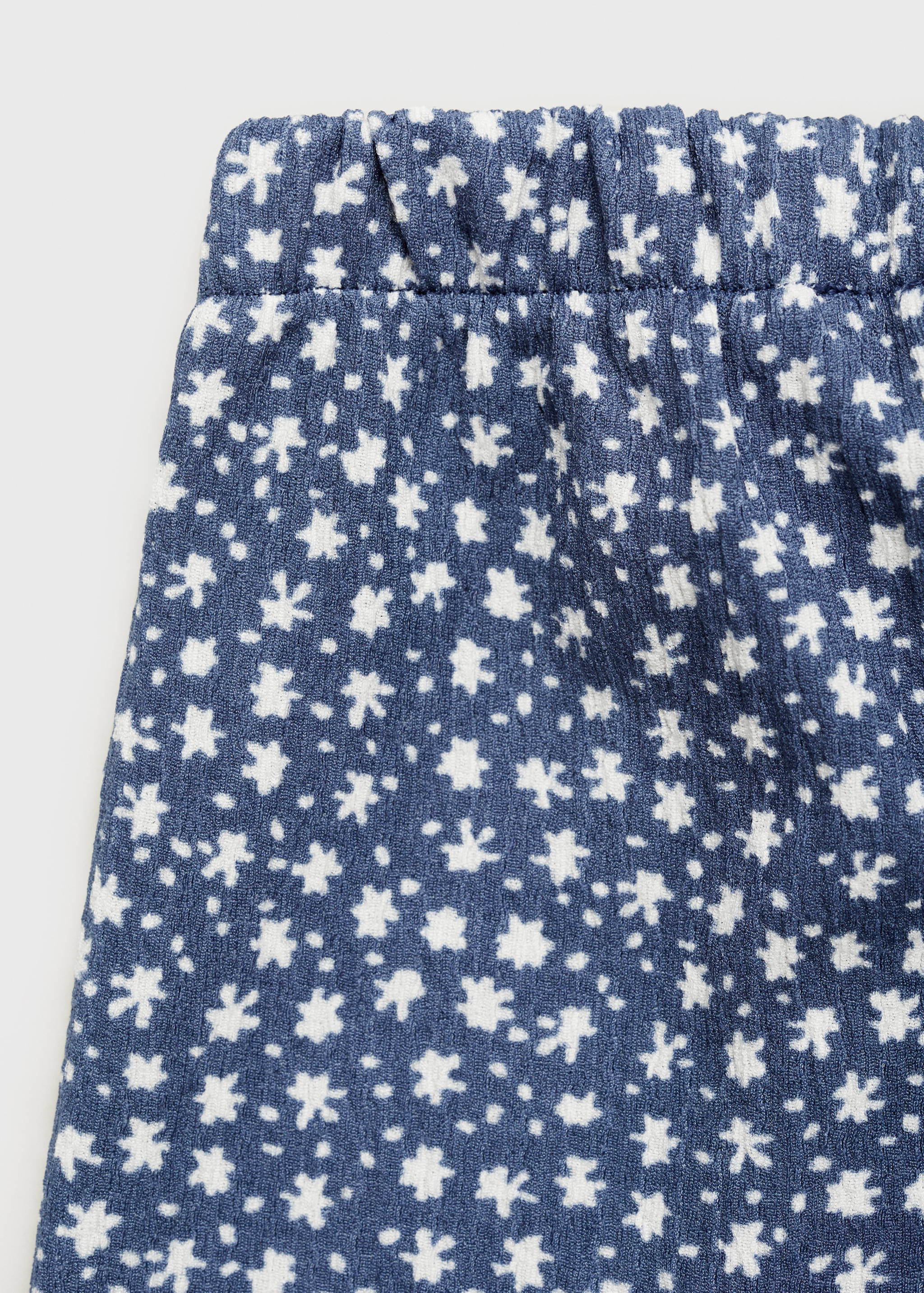 Printed flared trousers - Details of the article 0