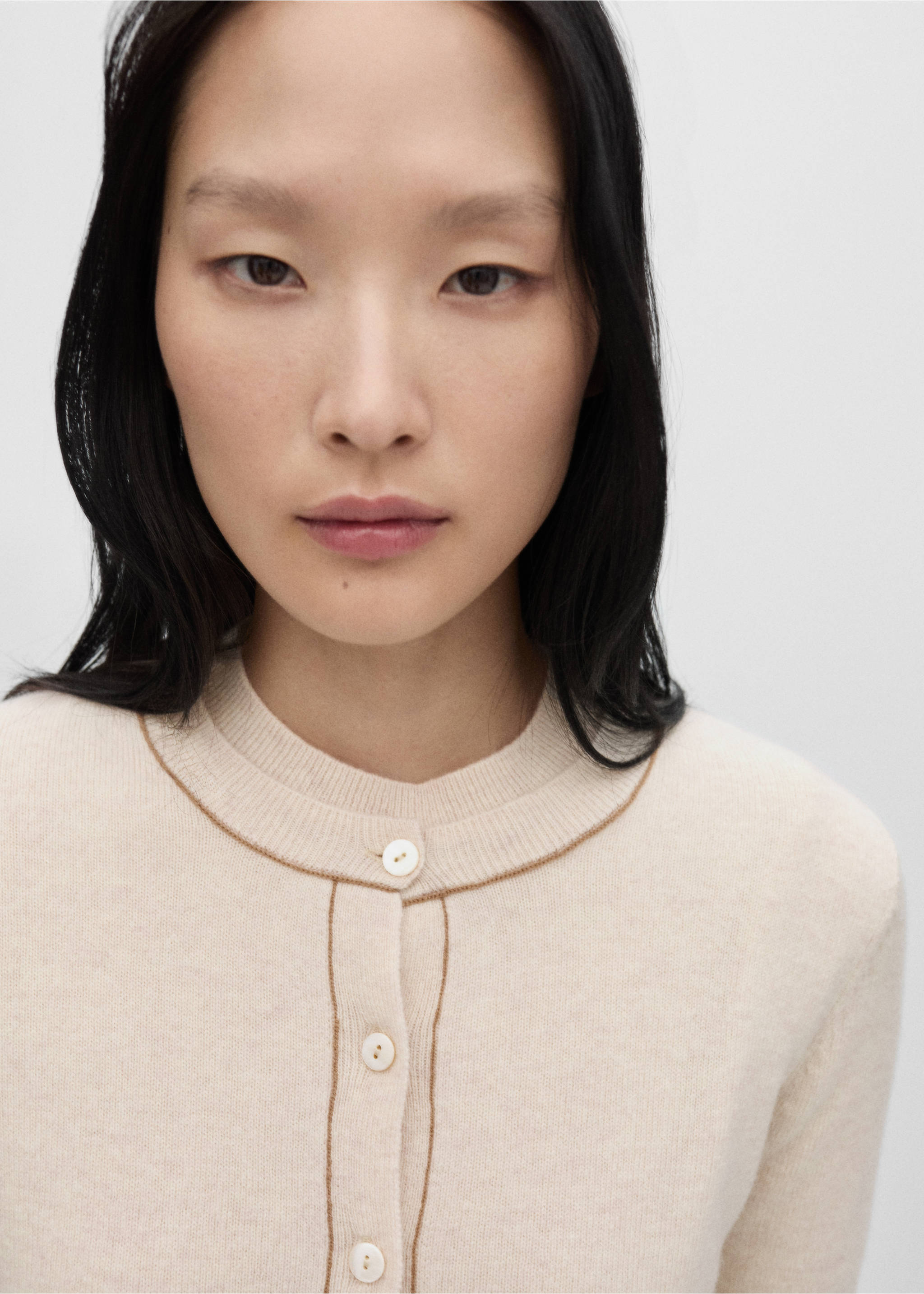 Wool cardigan with decorative stitching - Details of the article 1, Beige. Ref: 77056743-00.