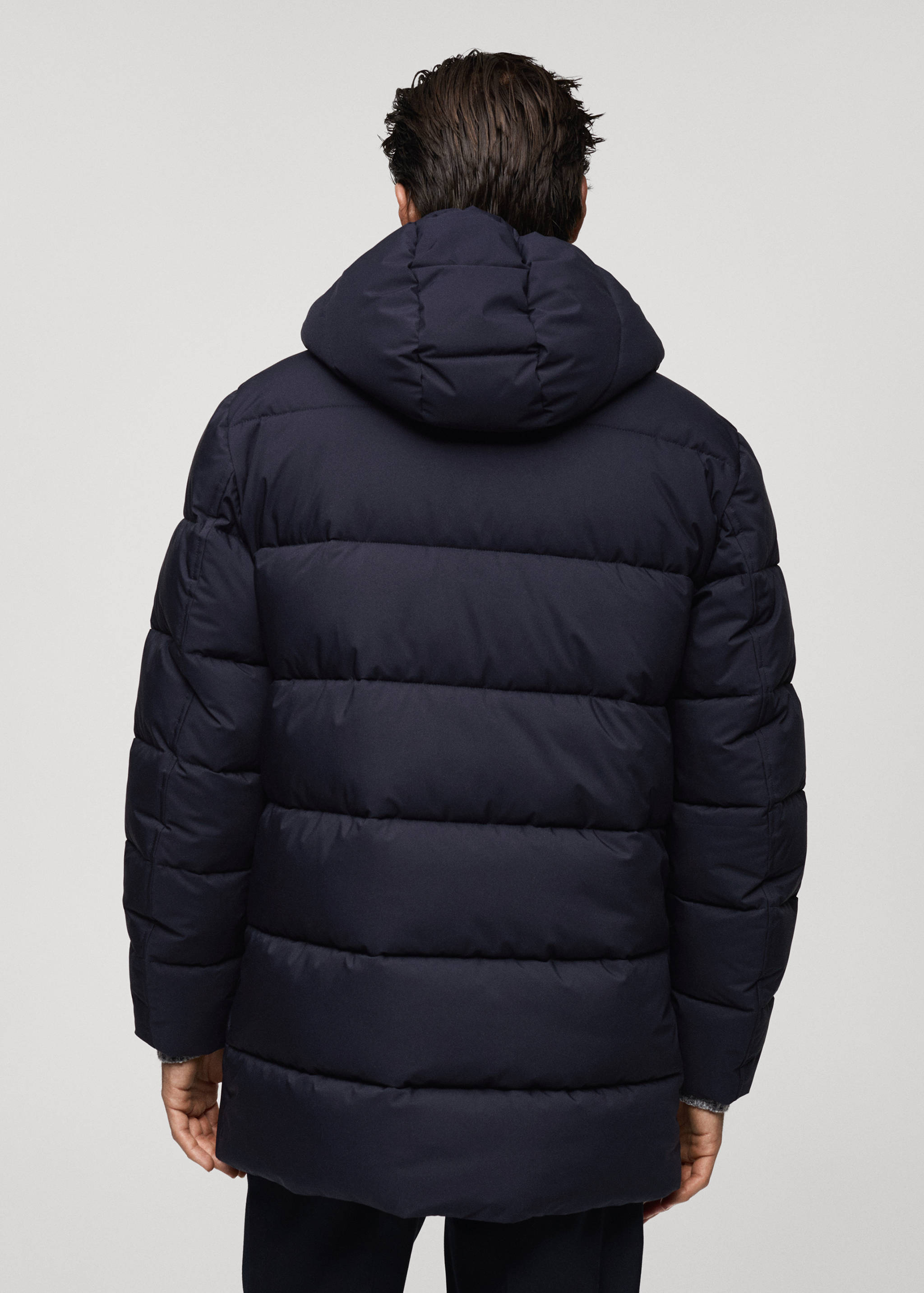 Water-repellent quilted coat - Reverse of the article