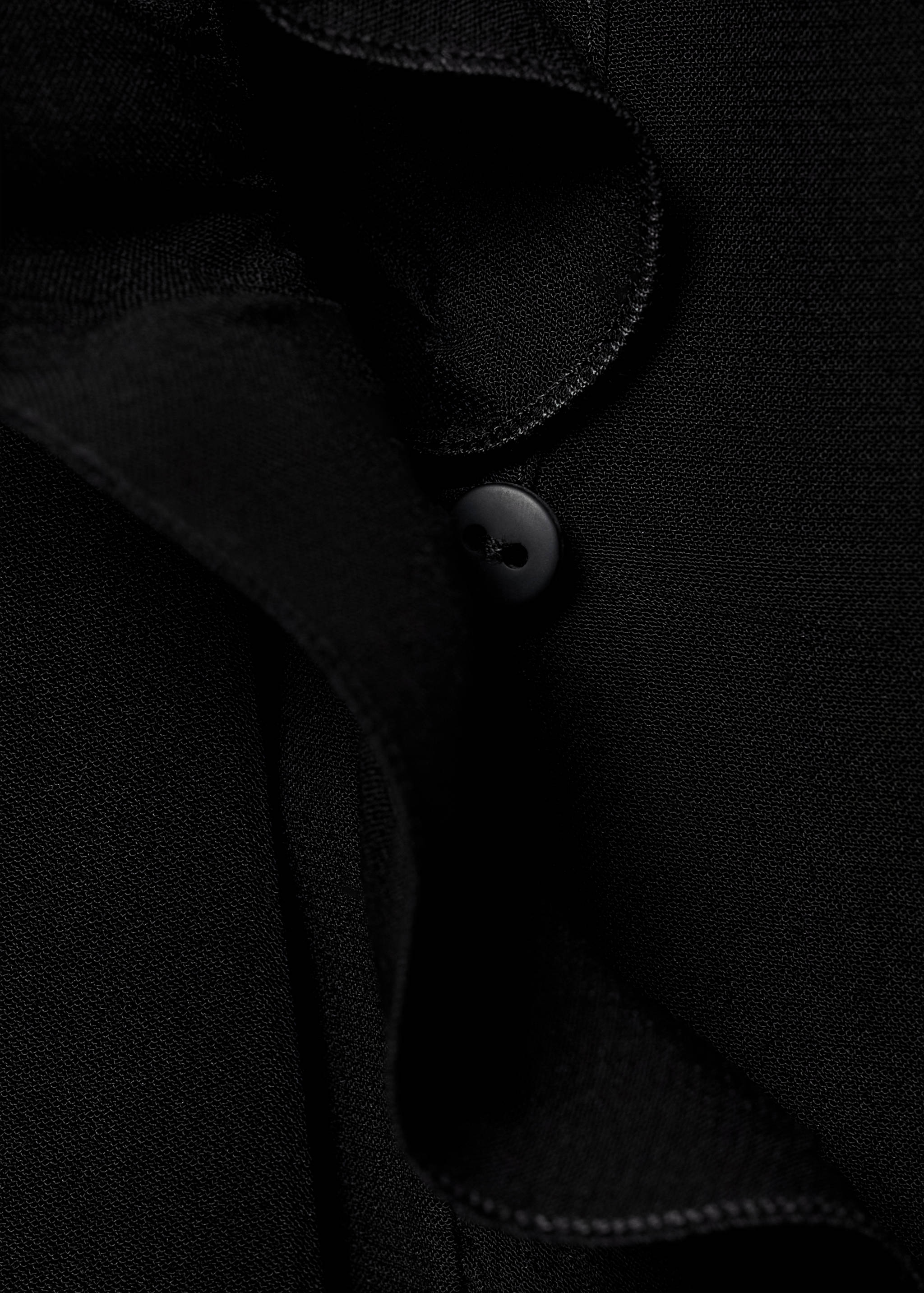 Magas nyakú fodros blúz - A termék adatai 0