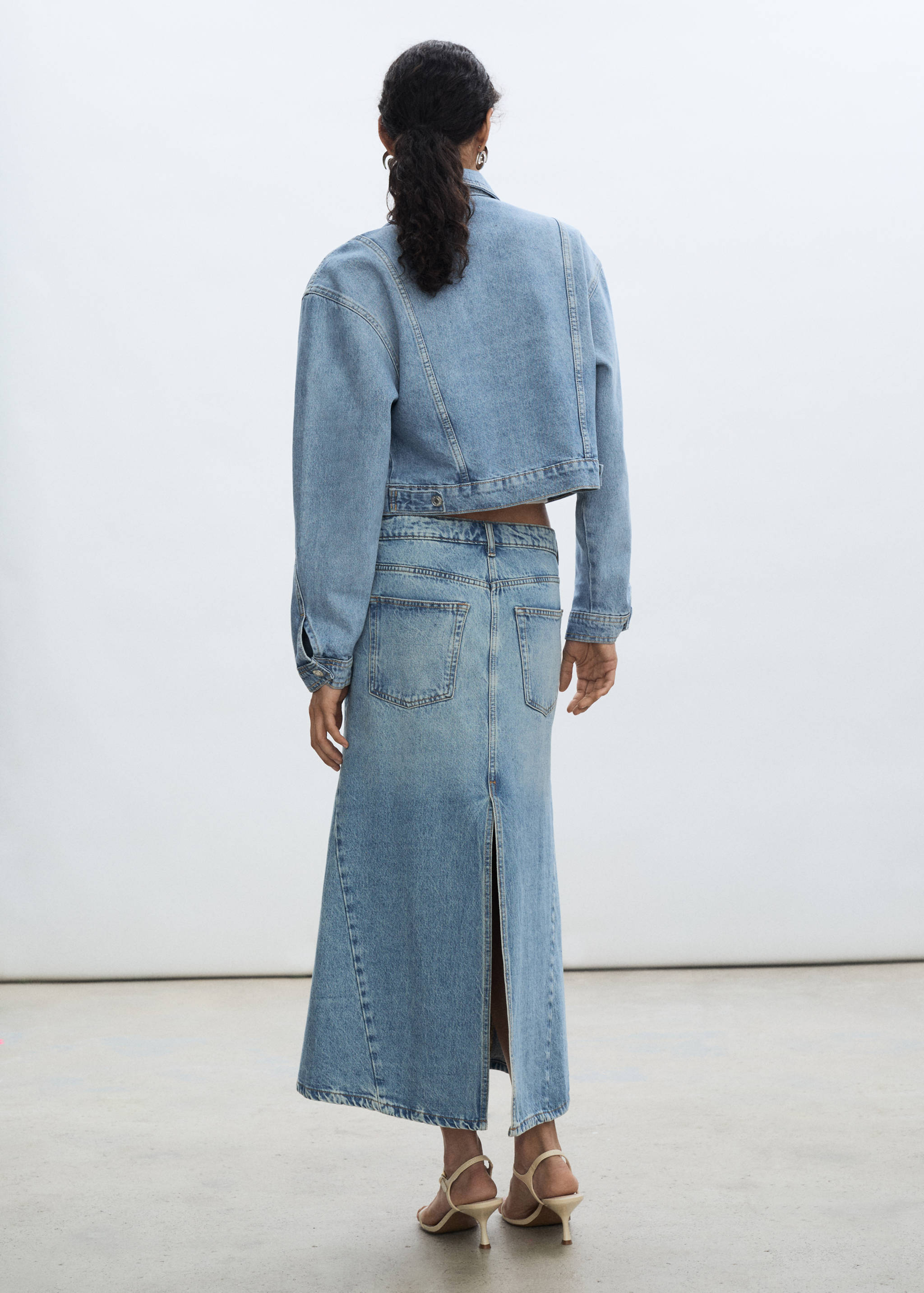 Pocketed denim jacket - Reverse of the article