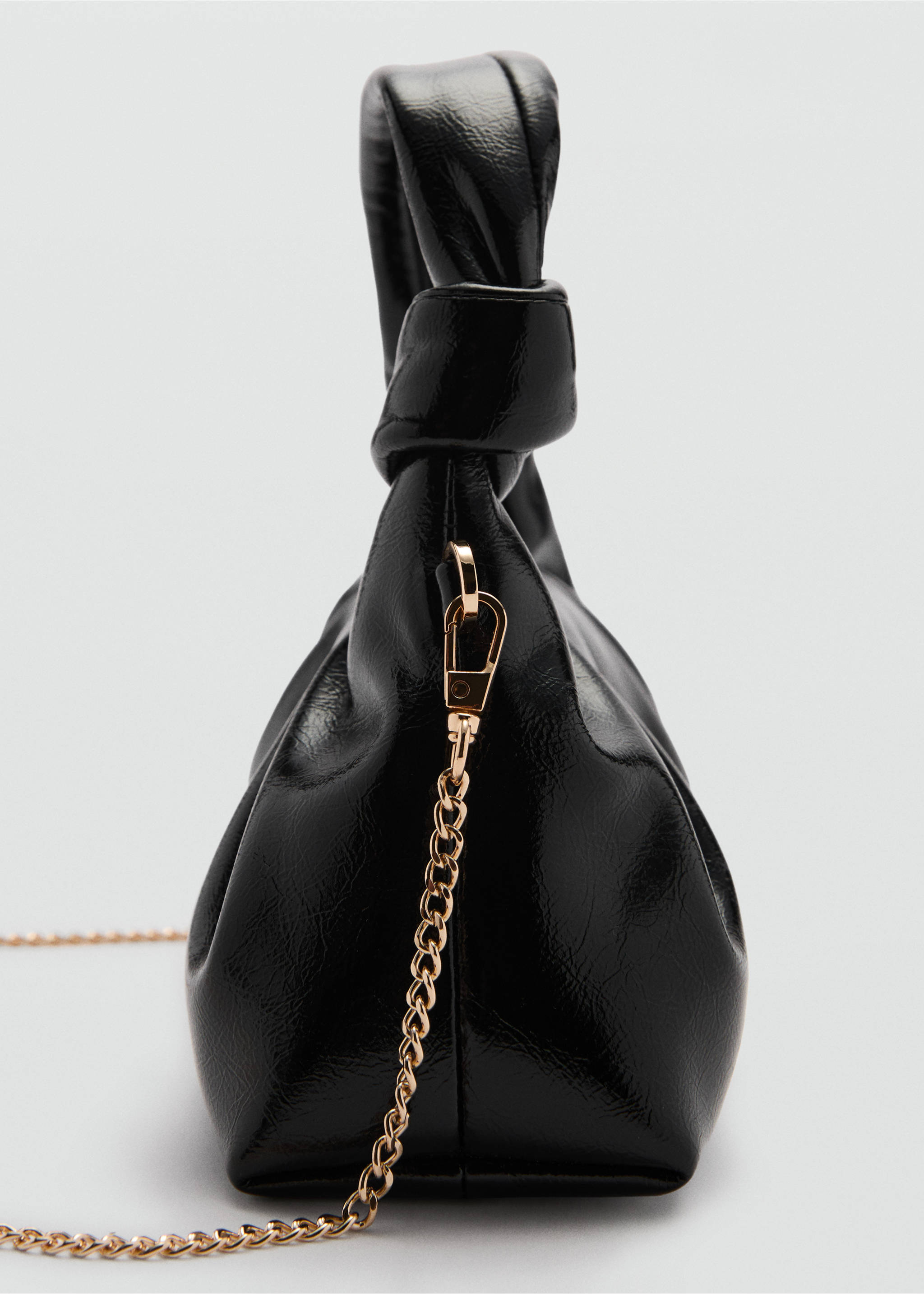 Chain mini bag - Details of the article 1, Black. Ref: 77063295-00.