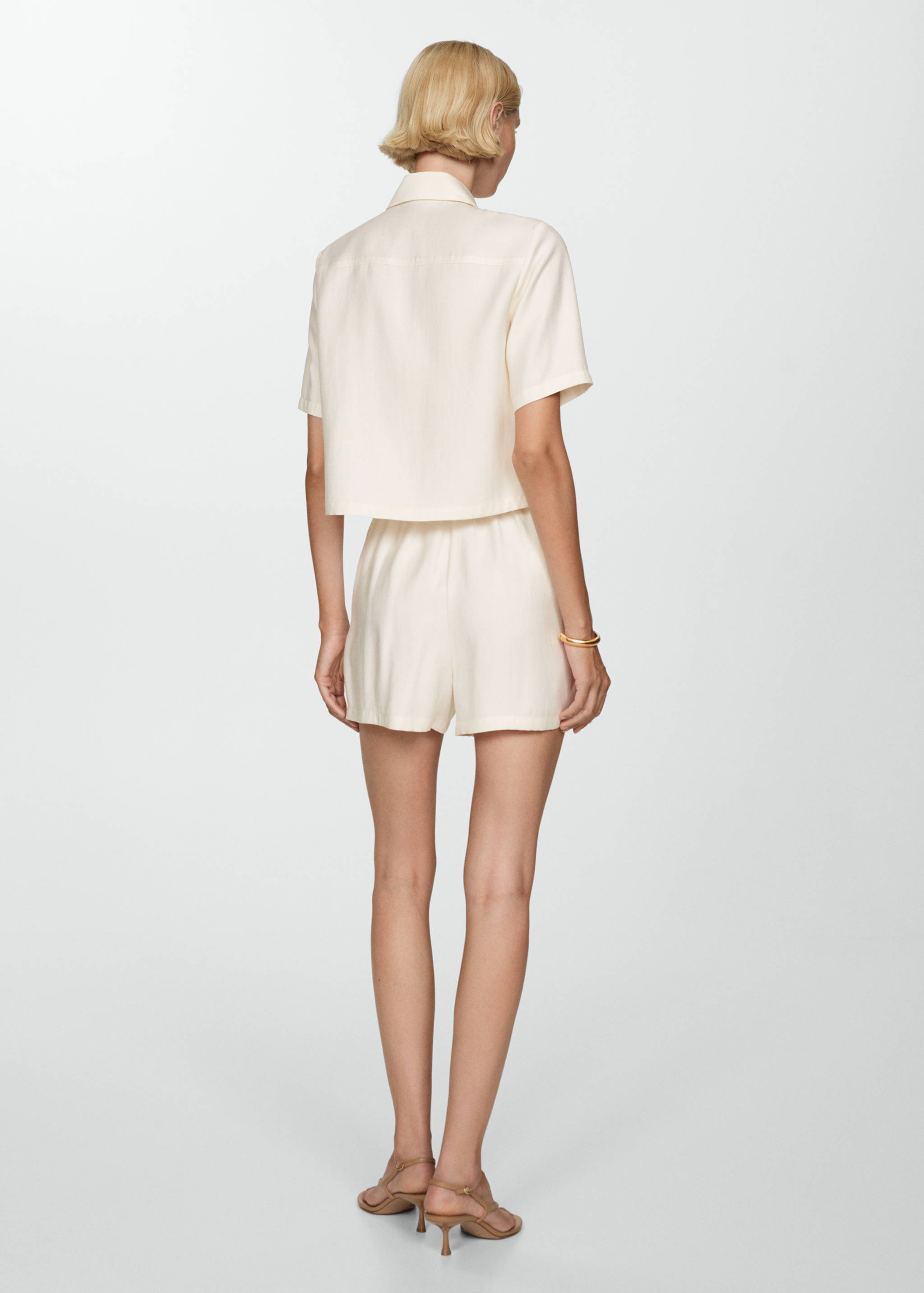 Shorts with jewel button - Reverse of the article