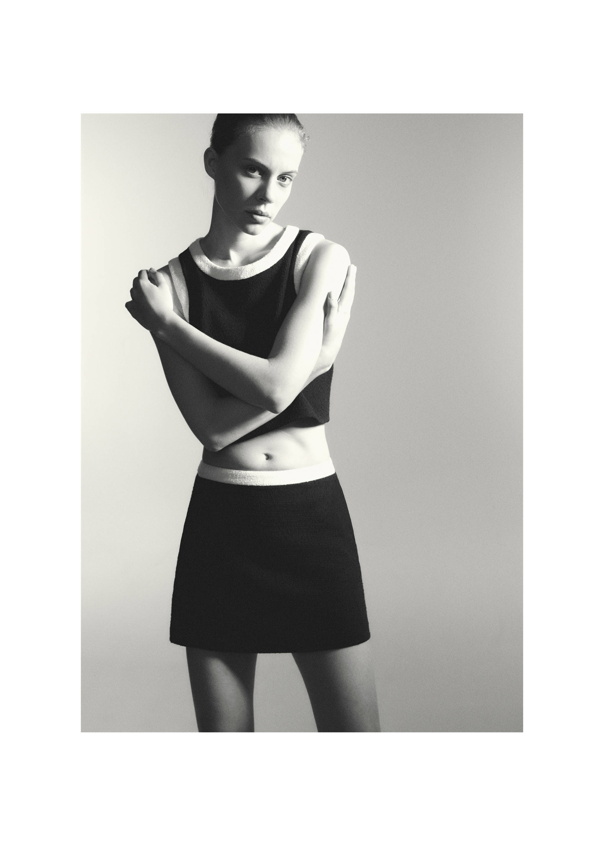 Tweed miniskirt - Details of the article 7, Black. Ref: 77064070-00.