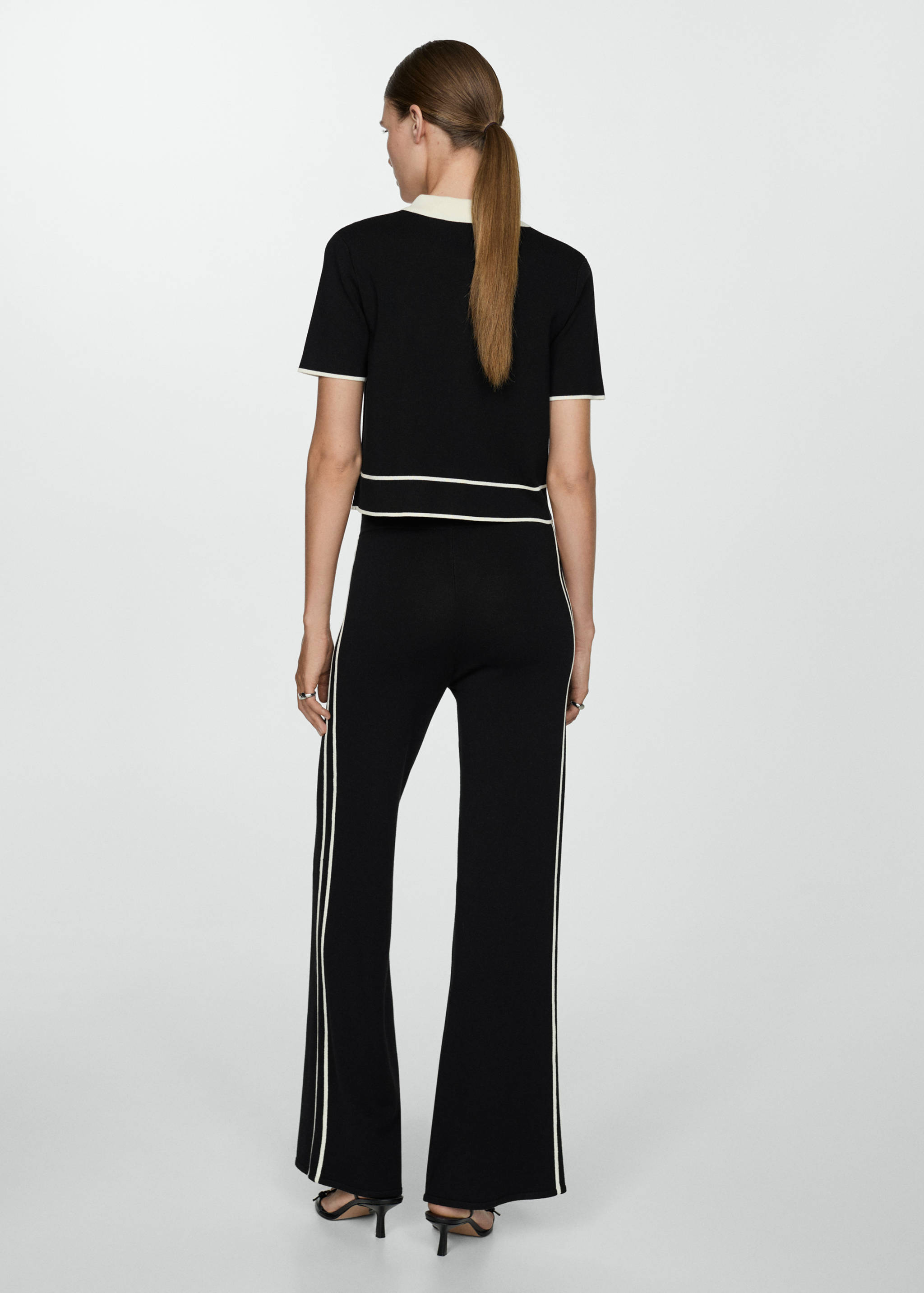 Knitted pants with contrasting stripes - Reverse of the article