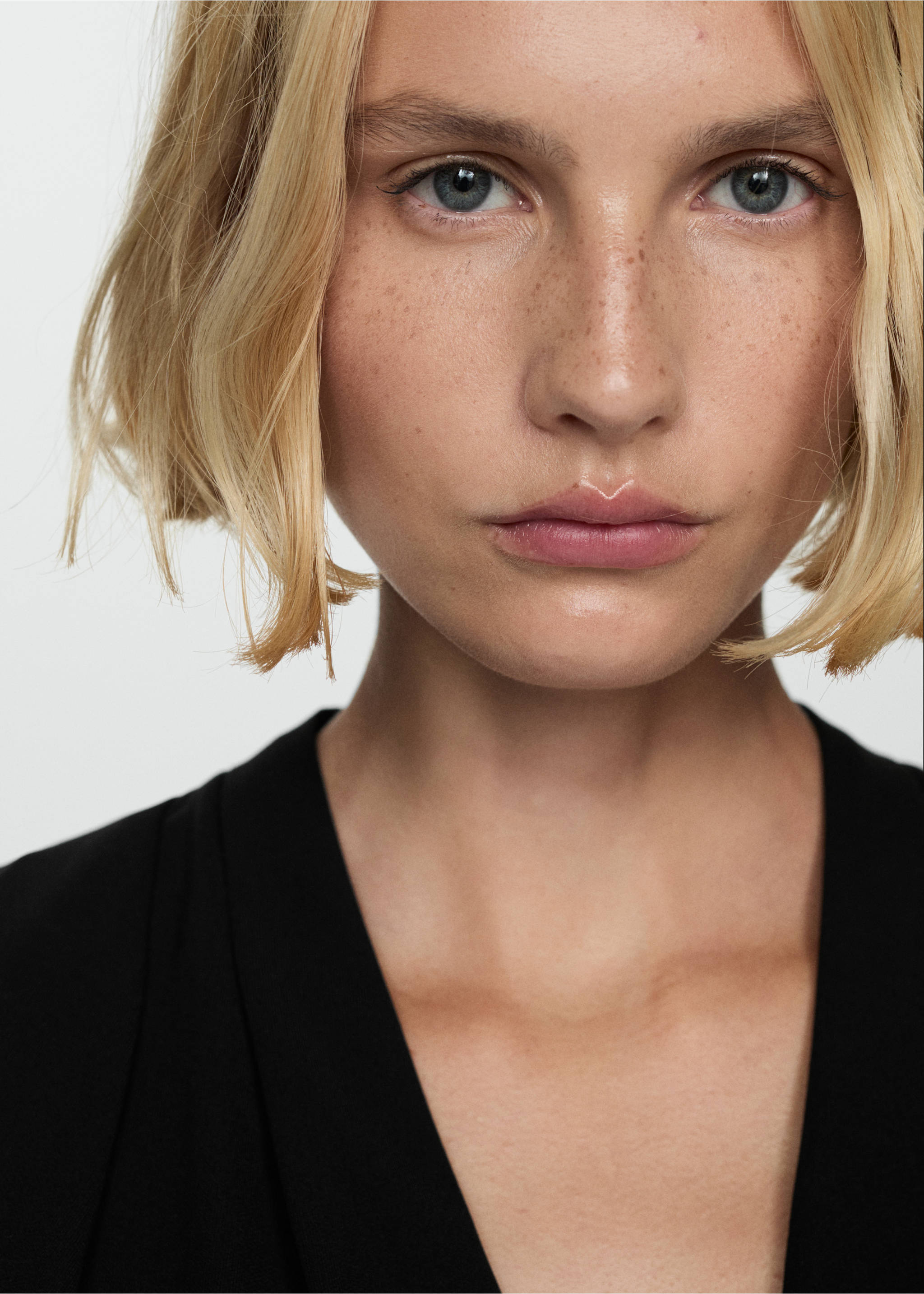 Long jumpsuit with crossover detail - Details of the article 1, Black. Ref: 77064776-00.