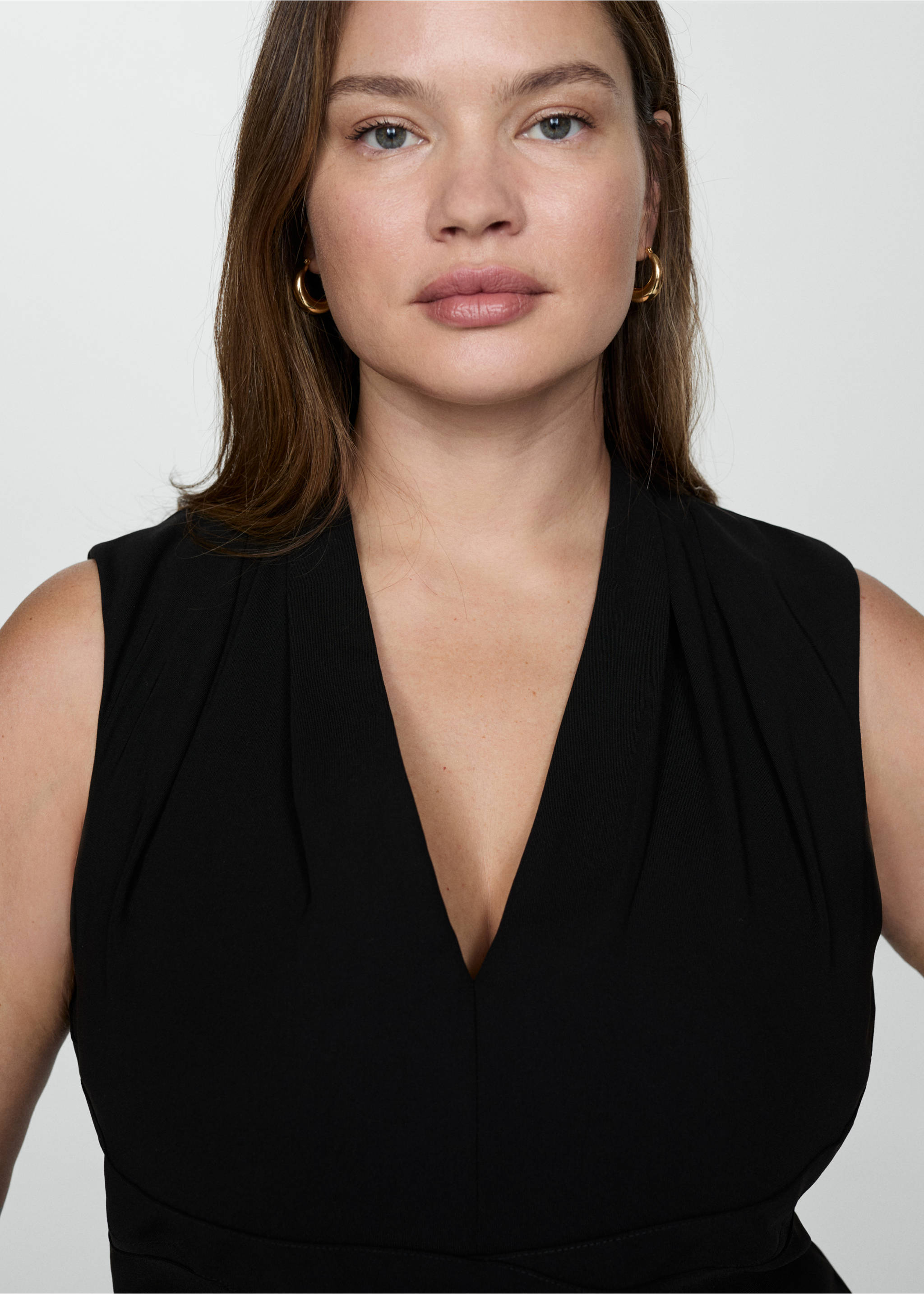 Long jumpsuit with crossover detail - Details of the article 5, Black. Ref: 77064776-00.