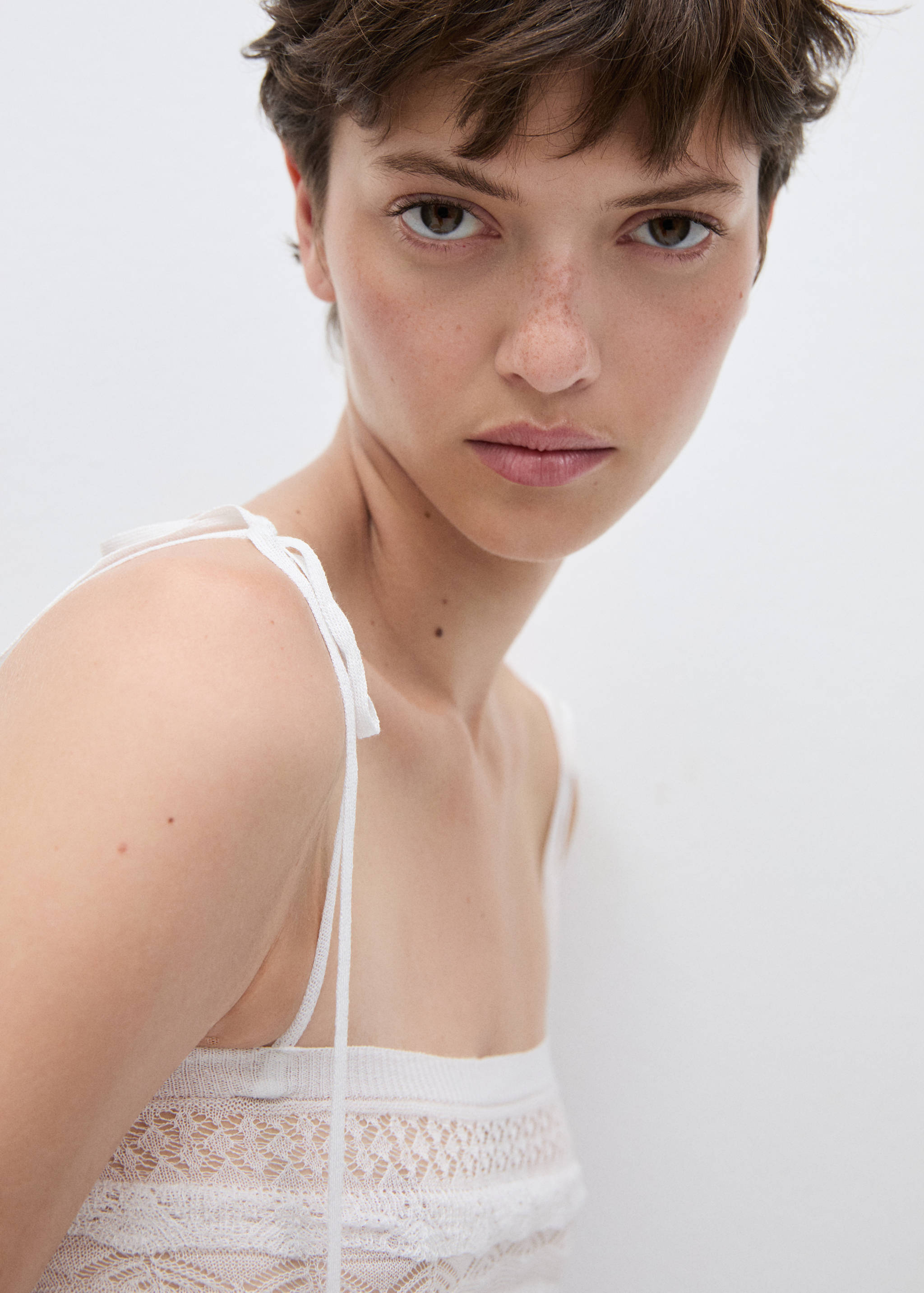 Top malha ponto aberto - Pormenor do artigo 1