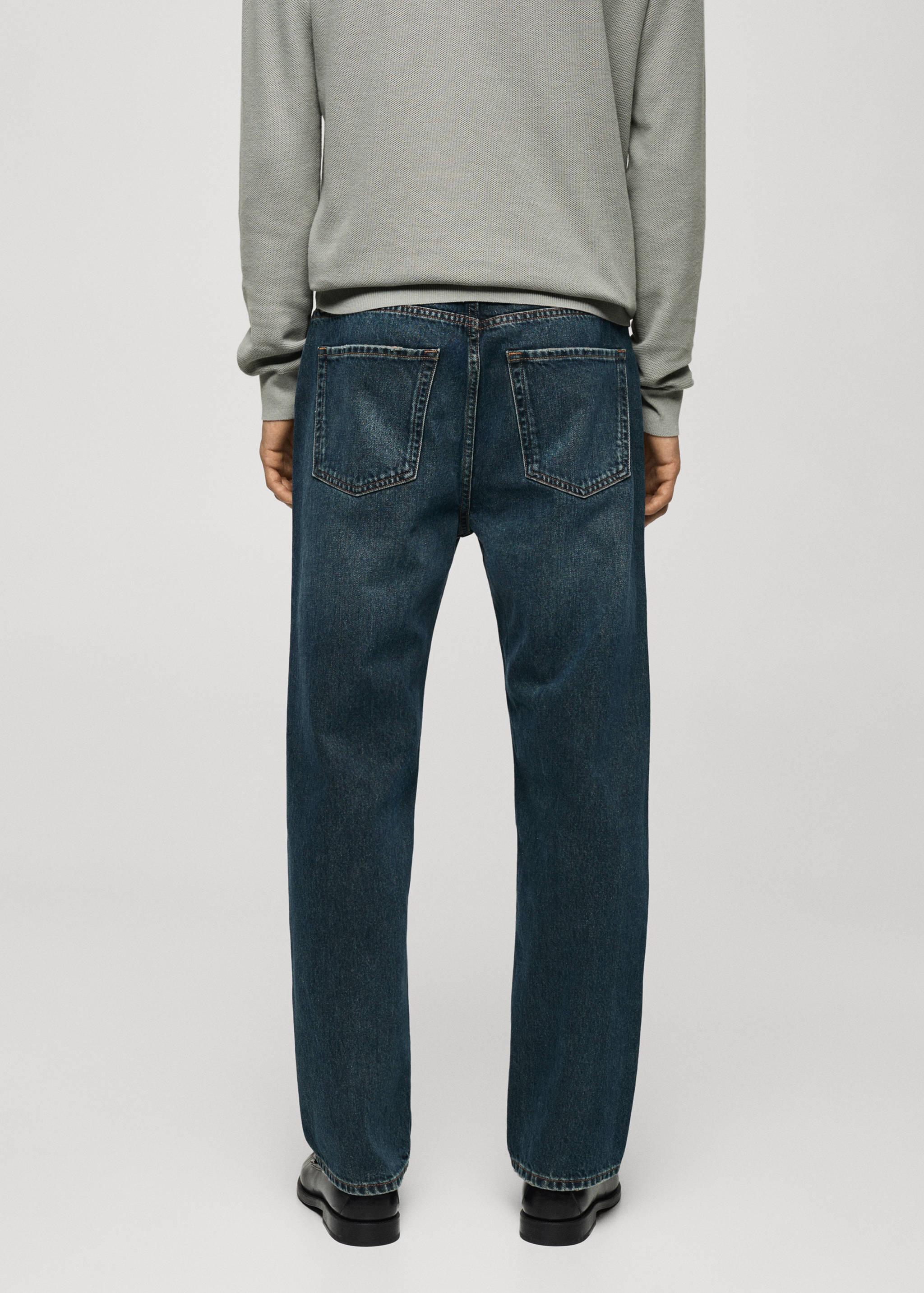 Distressed dark-wash straight fit jeans - Reverse of the article