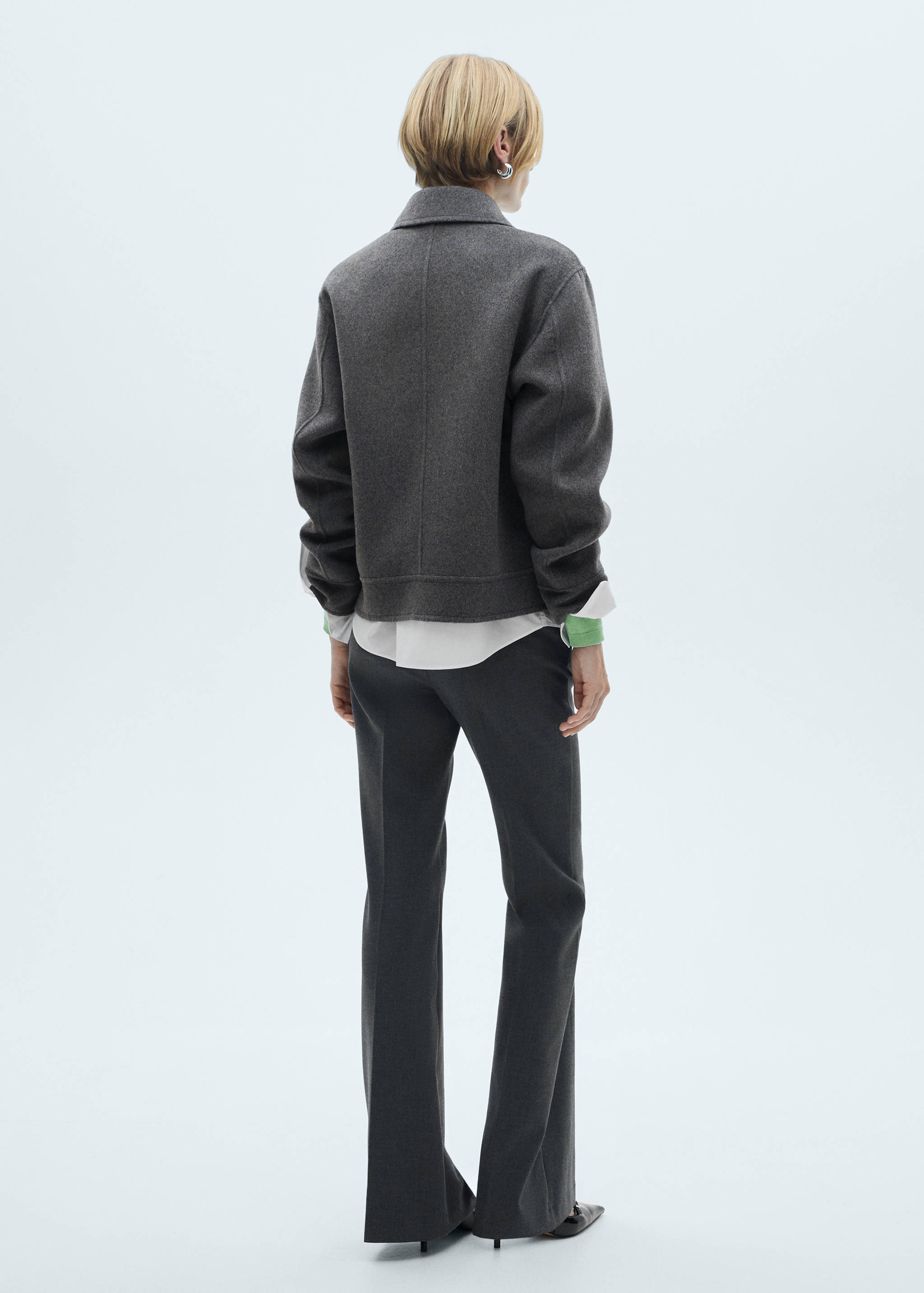 Wool jacket with pockets - Reverse of the article