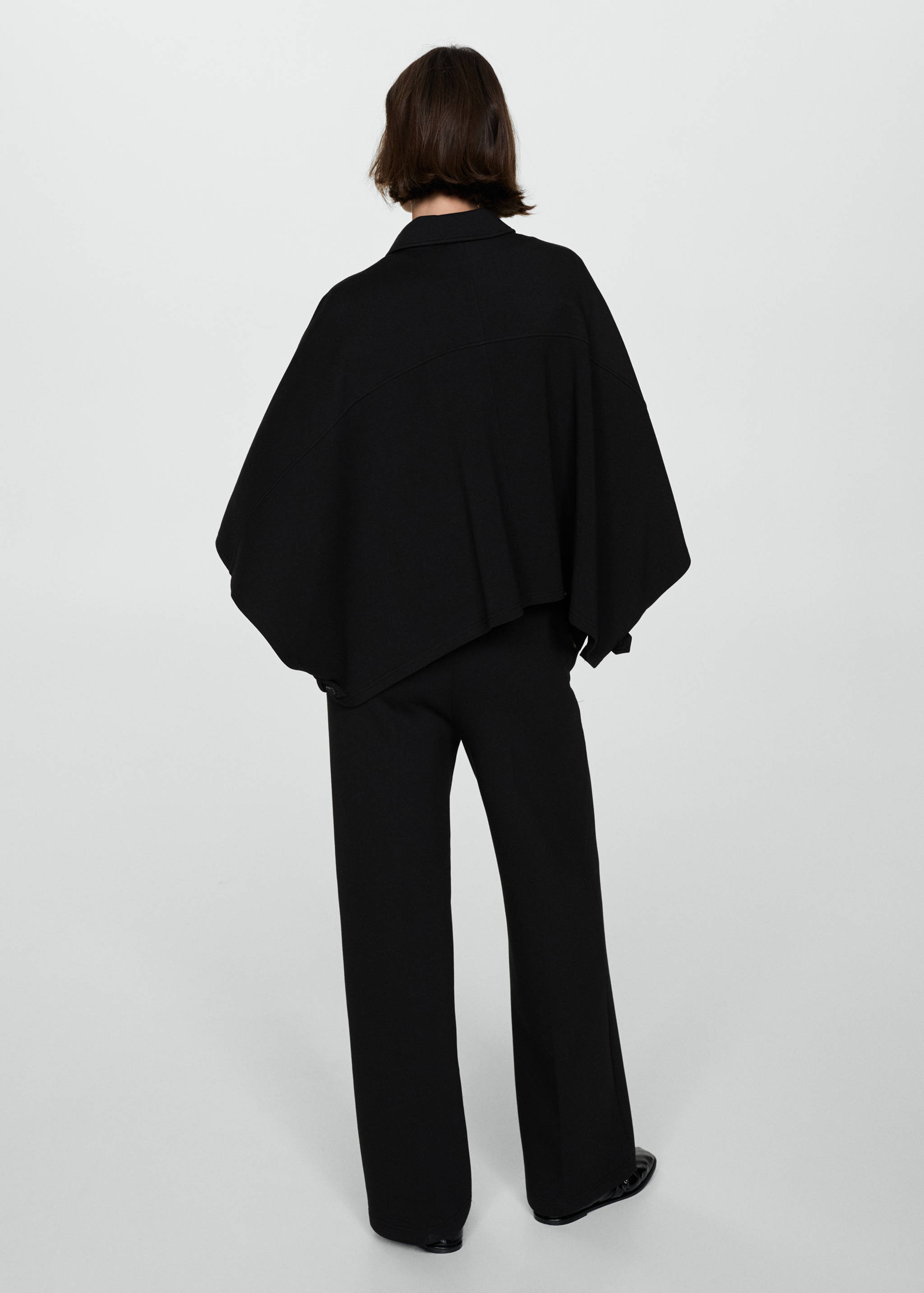 Cape jacket with buttons - Reverse of the article