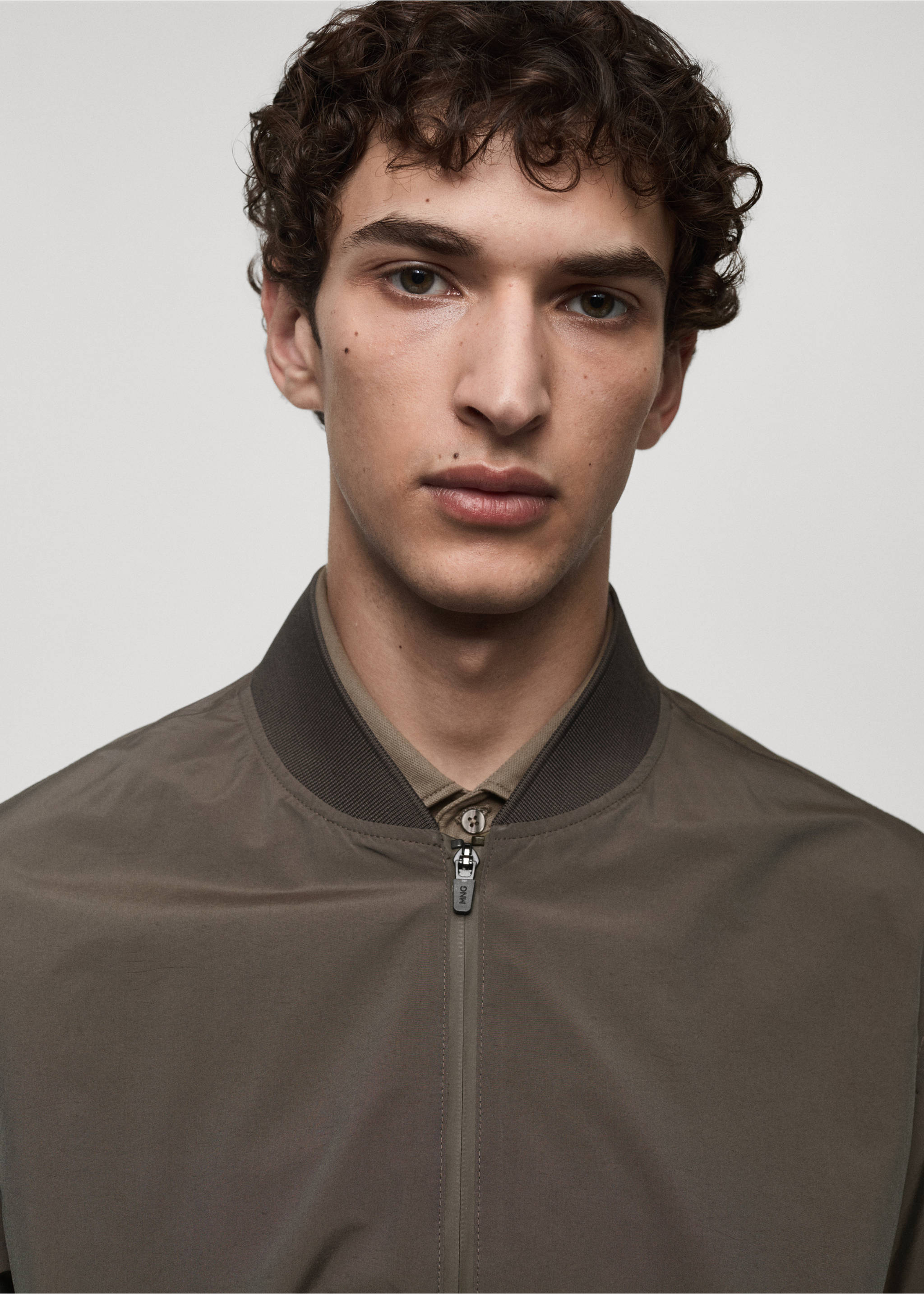 Bomber jacket in waterproof technical fabric - Details of the article 1, Brown. Ref: 77065962-00.