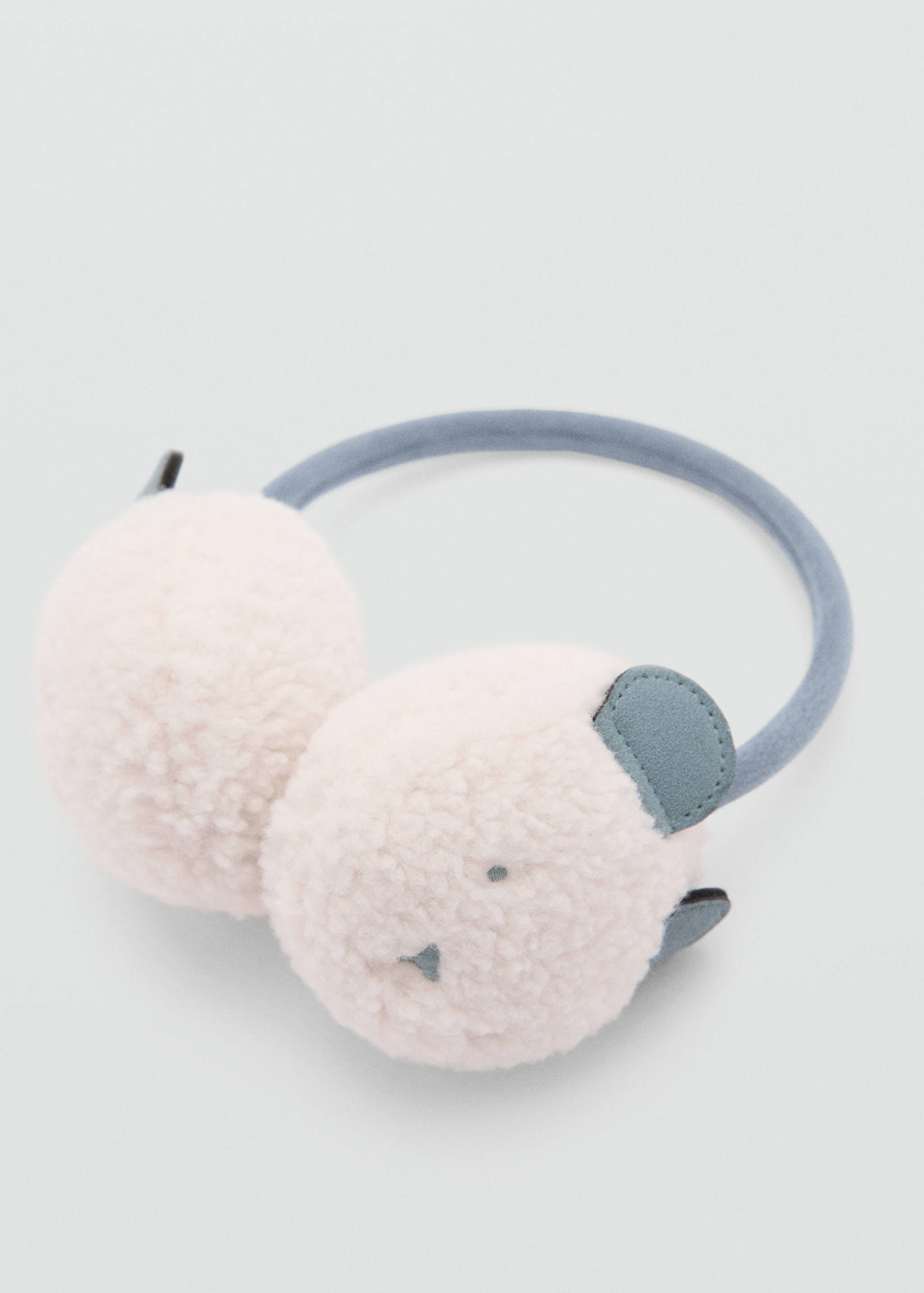 Öronmuffar i fårskinnspäls - Bild av mittparti