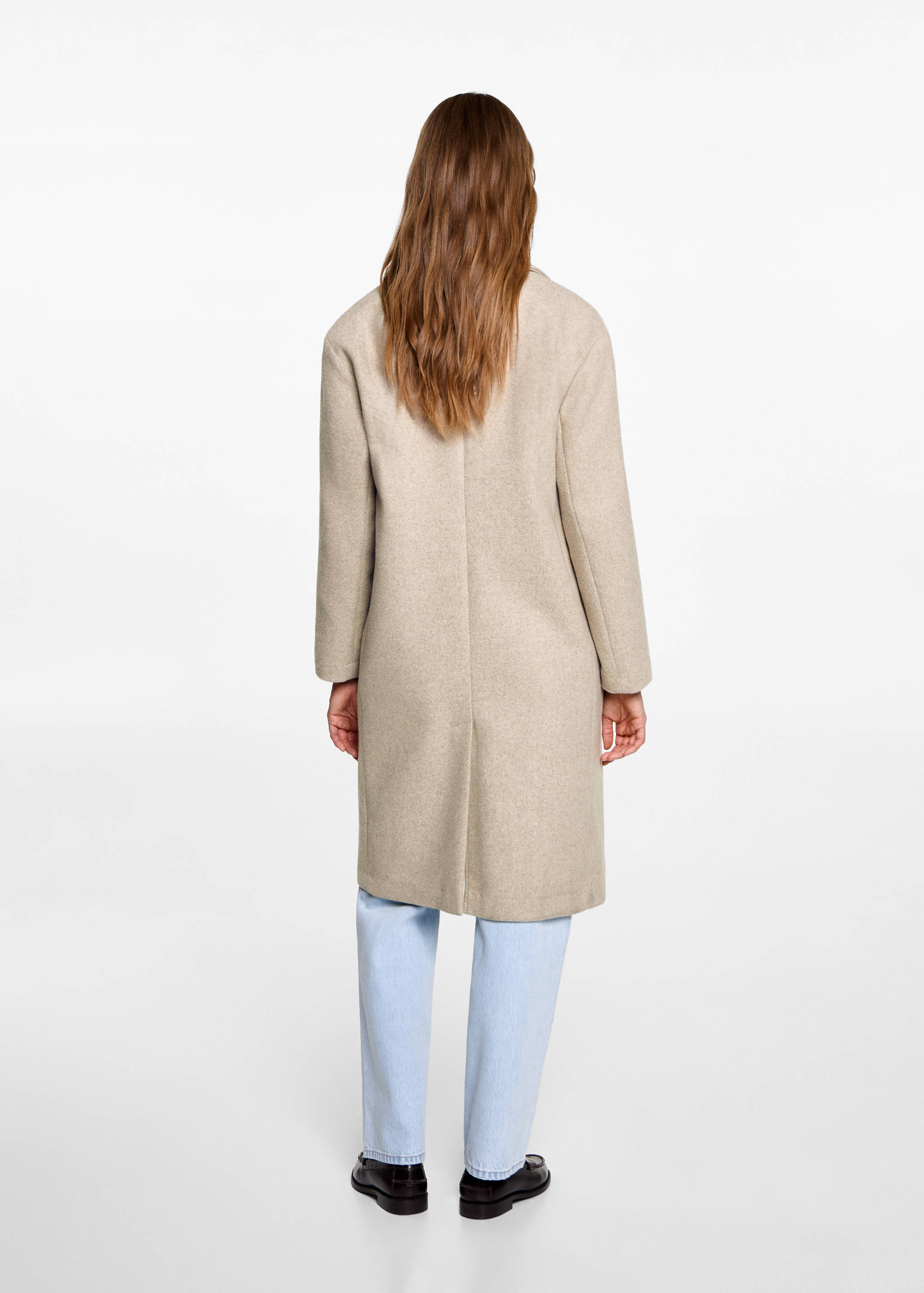 Handmade wool coat - Reverse of the article