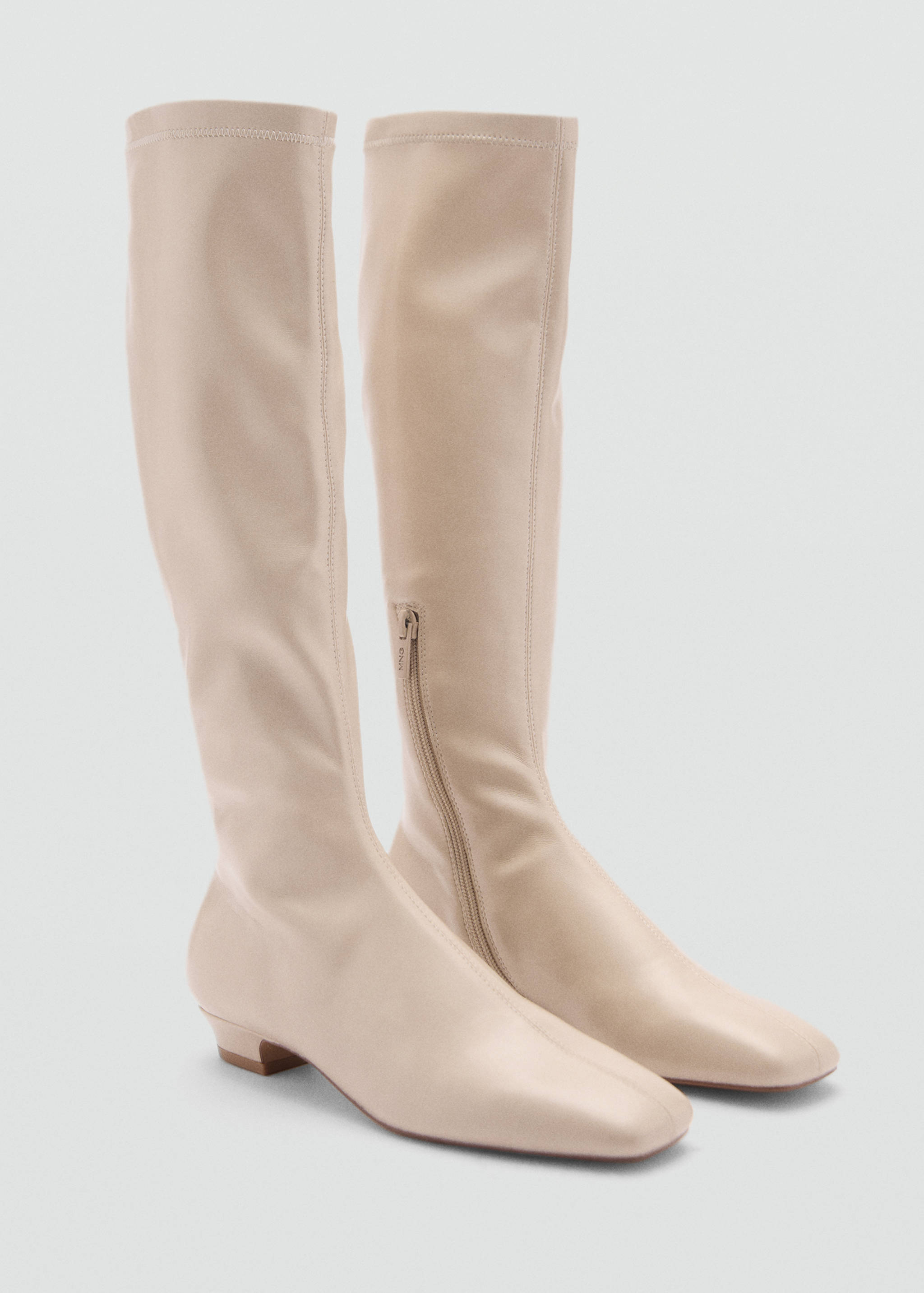 Höga stövlar dragkedja - Bild av mittparti