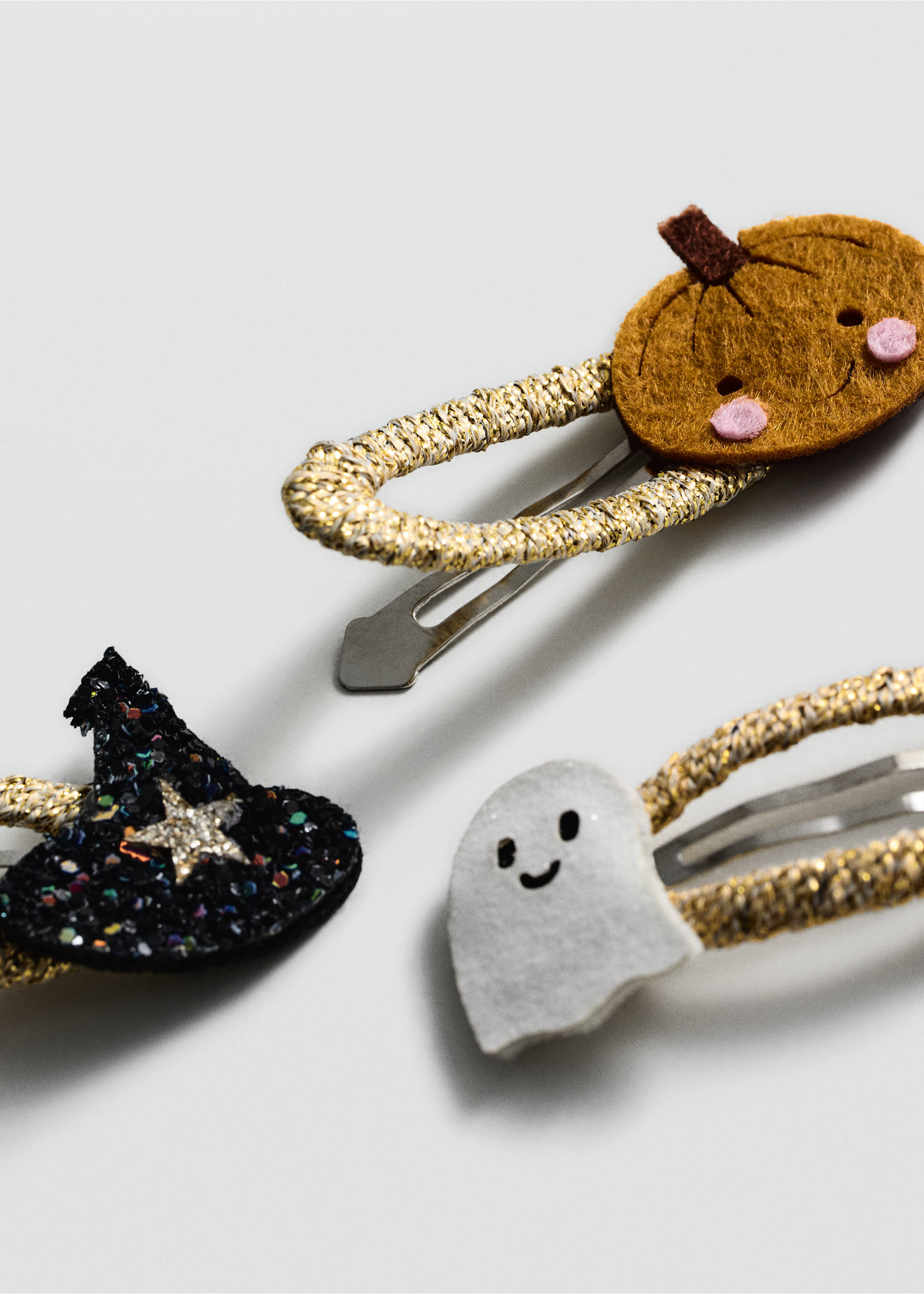 Halloween hair clip - Medium plane, Gold. Ref: 77067121-00.