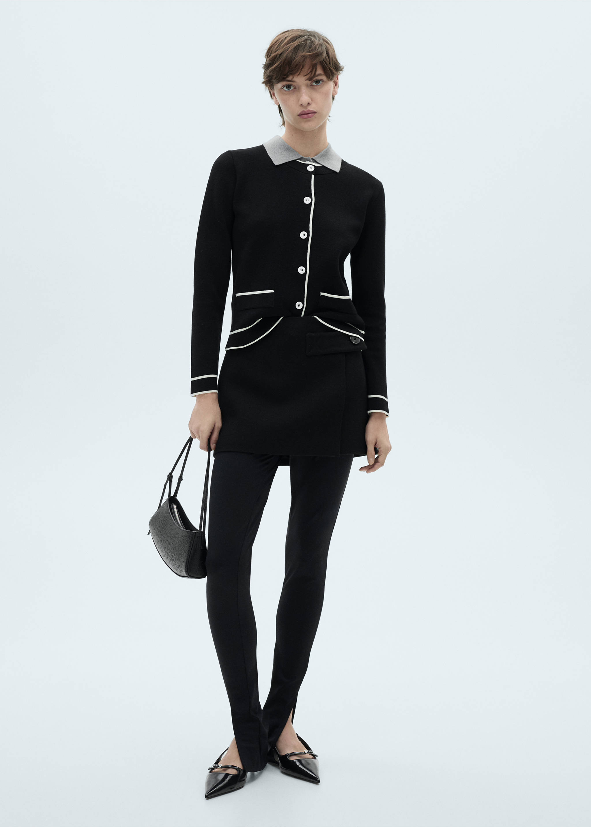 Cardigan bordi a contrasto - Piano generale, Nero. Ref: 77069076-00.