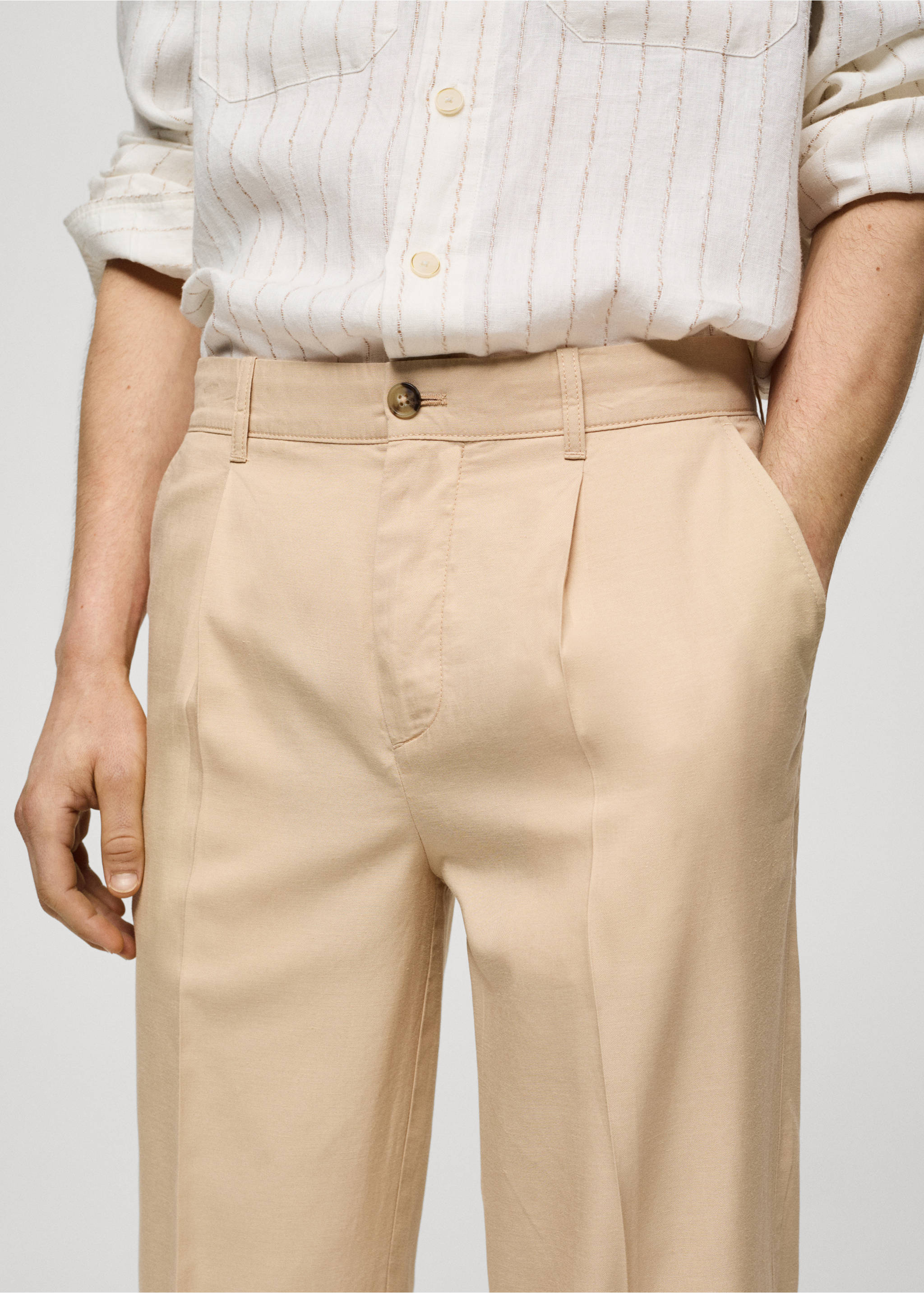 Cotton lyocell pleated trousers - Details of the article 1, Vanilla. Ref: 77070562-00.