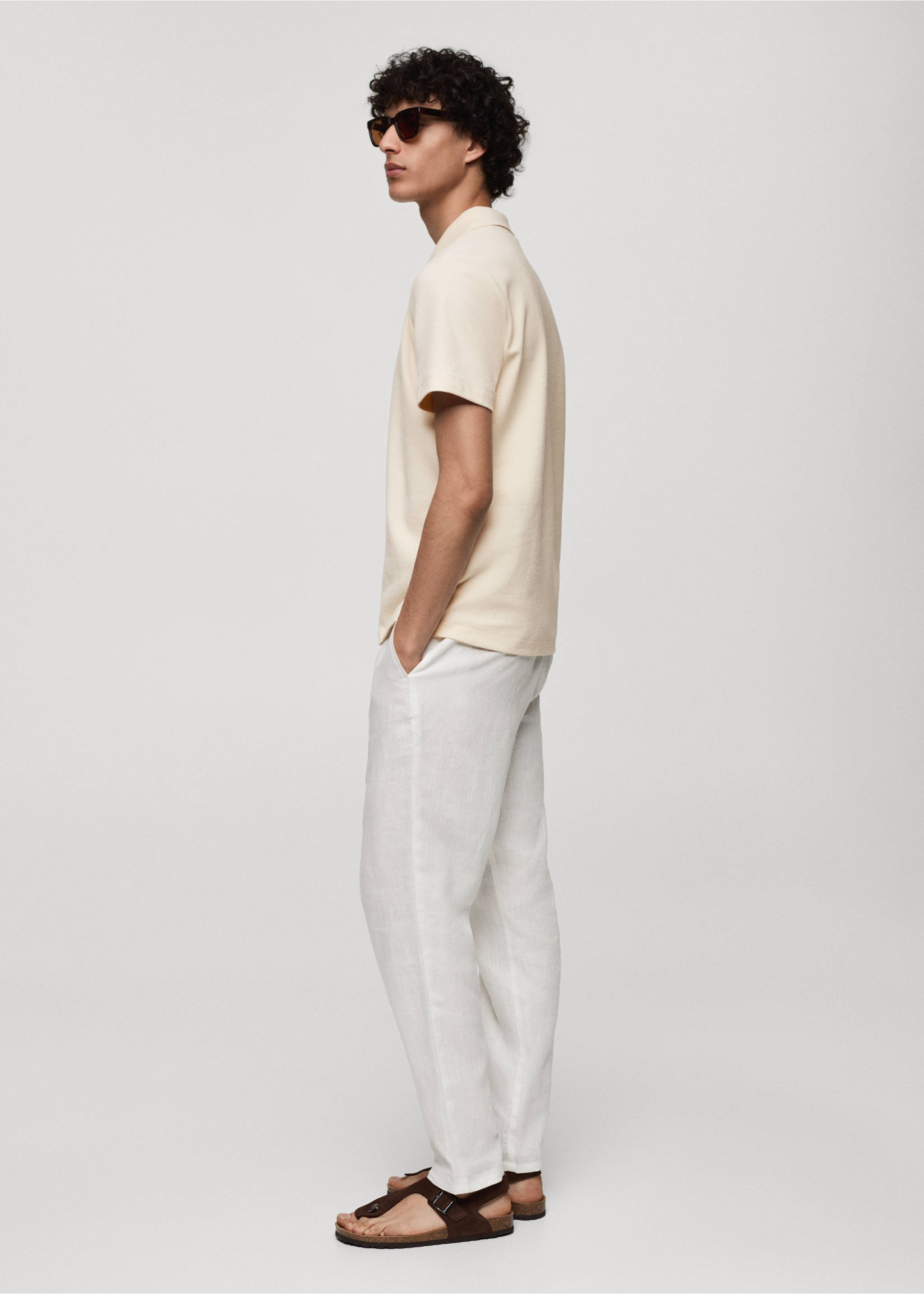 Regular-fit textured cotton polo shirt - Details of the article 2, Ecru. Ref: 77070618-00.