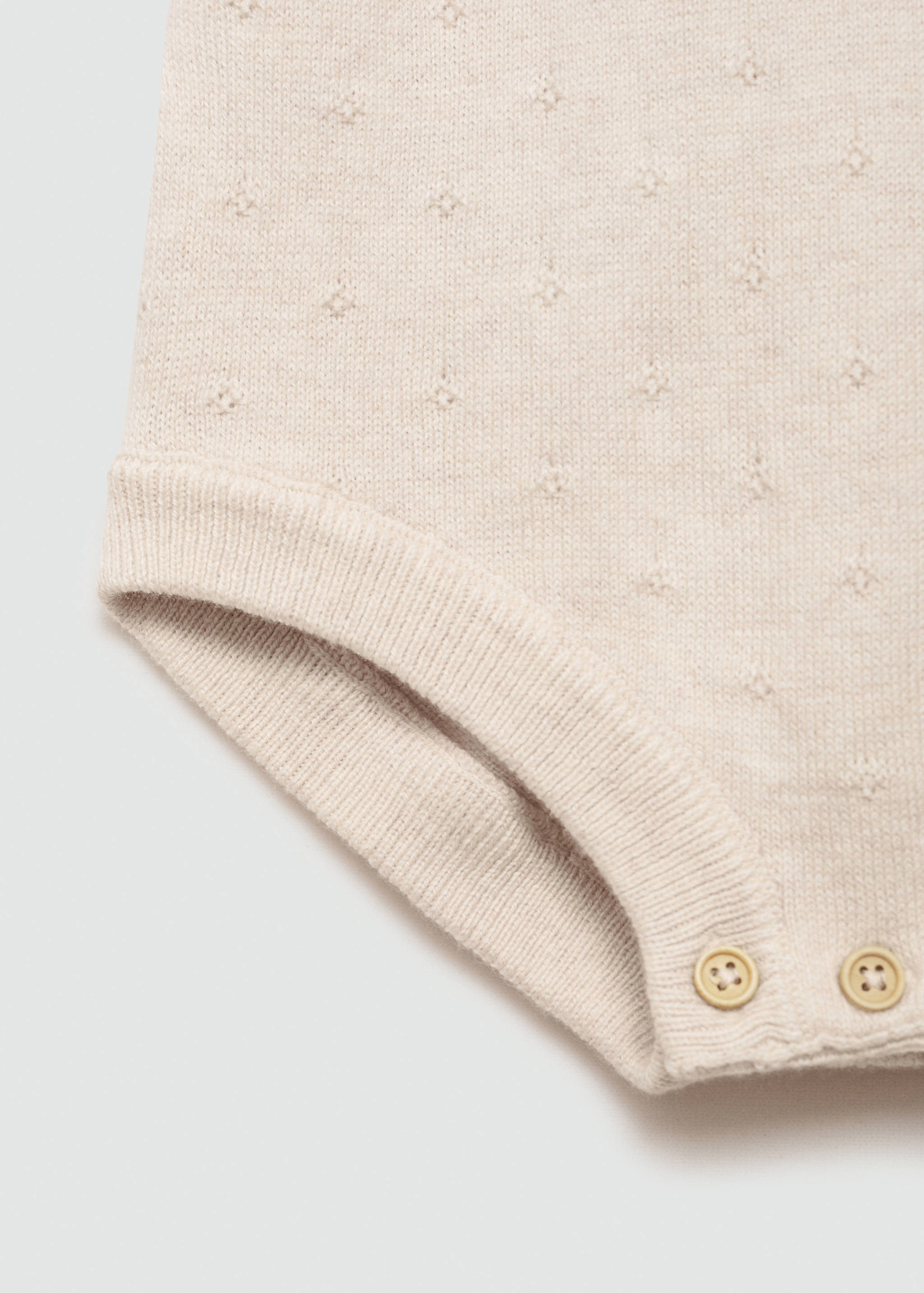 Strickstrampler mit Tasche - Detail des Artikels 8