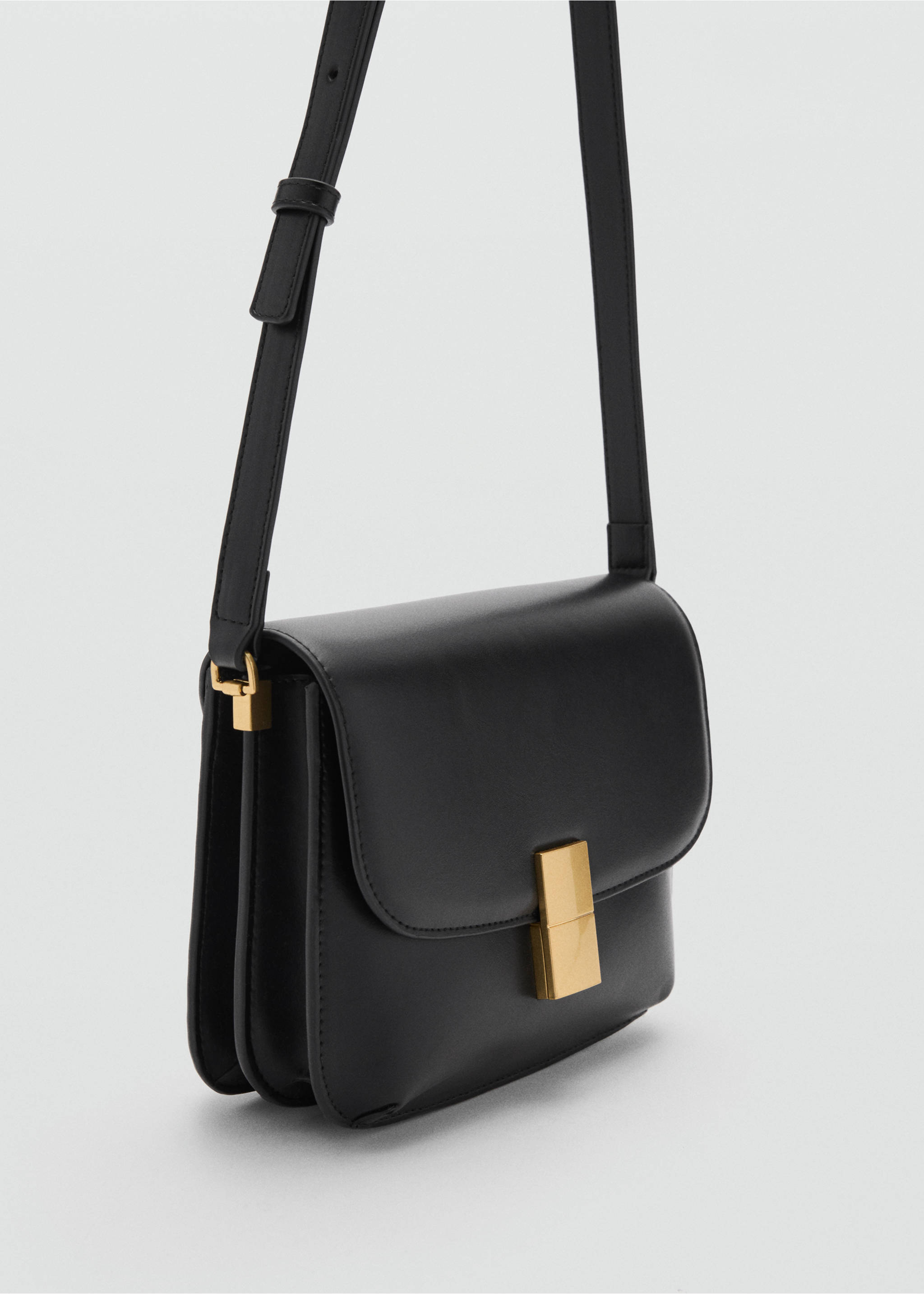 Crossbody bag with metal closure - Medium plane, Black. Ref: 77074011-00.