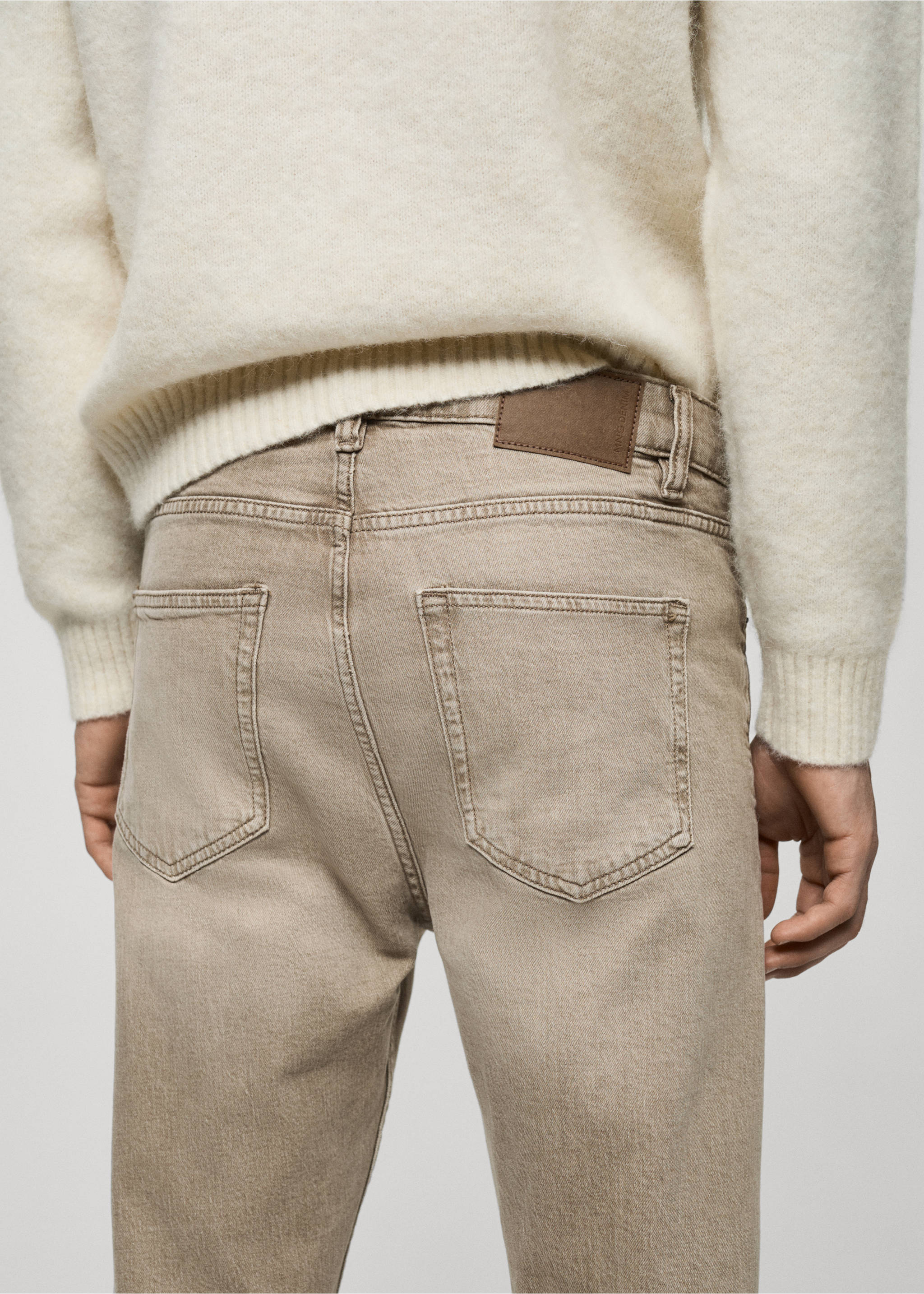 Jeans Ben tapered fit - Details of the article 6, Sand. Ref: 77074438-00.
