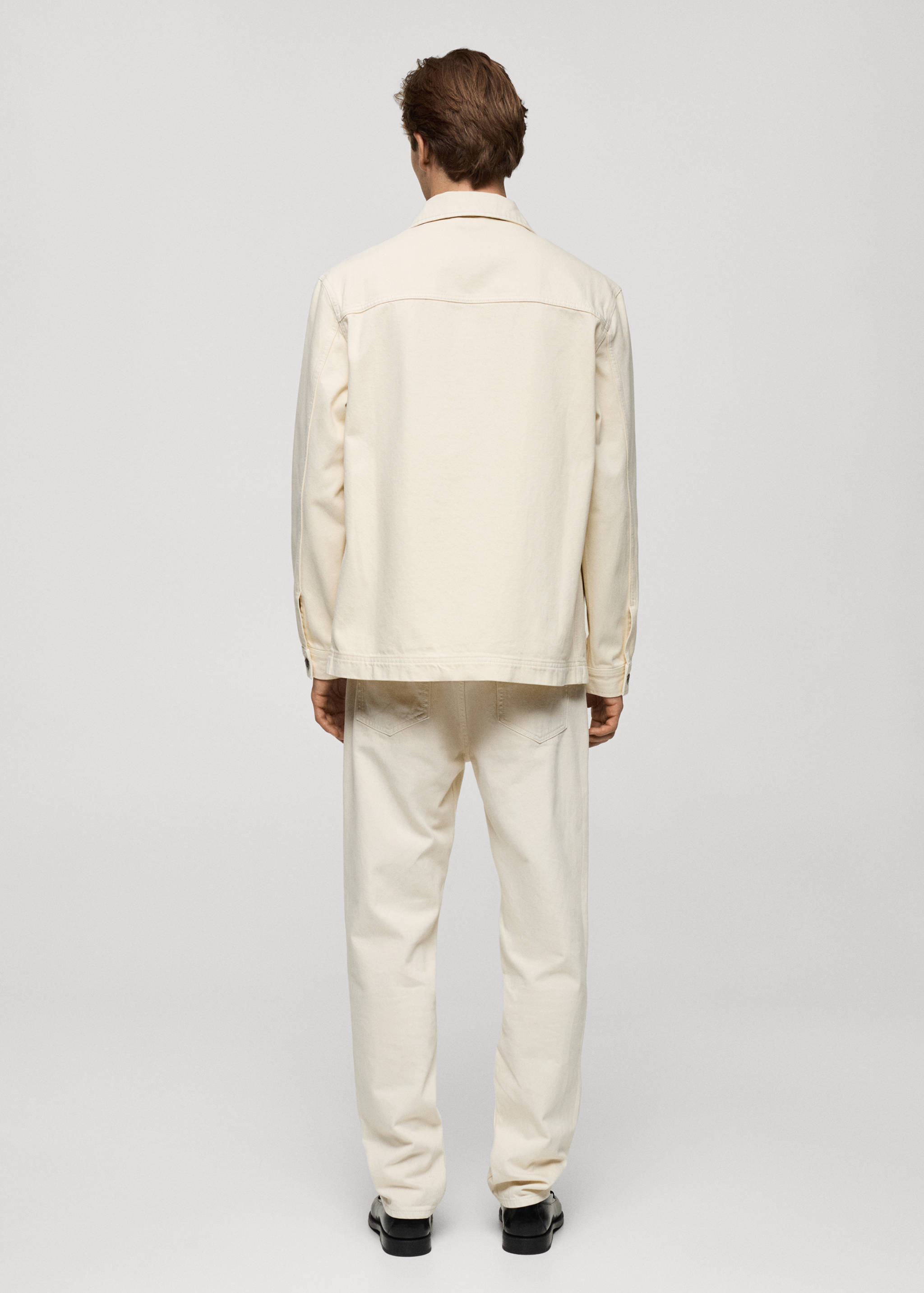 Denim overshirt pockets - Reverse of the article