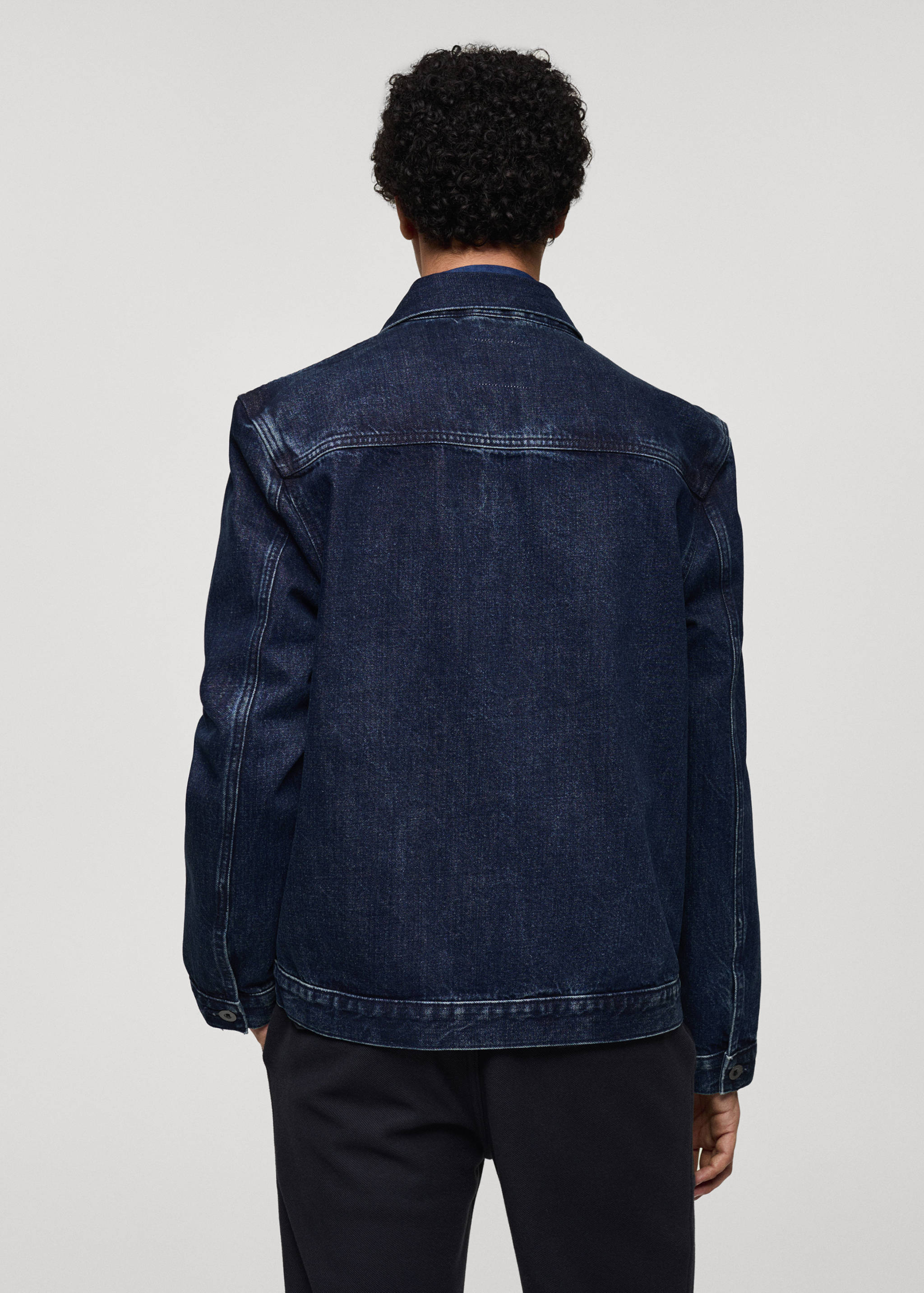 Pocketed denim jacket - Reverse of the article