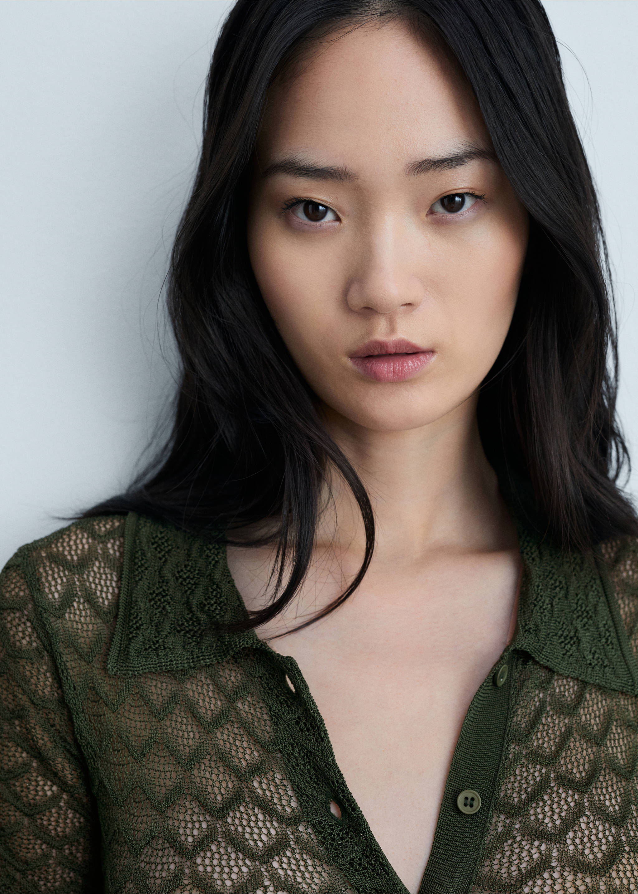 Flared pleated trousers - Details of the article 1, Pastel Green. Ref: 77074791-00.