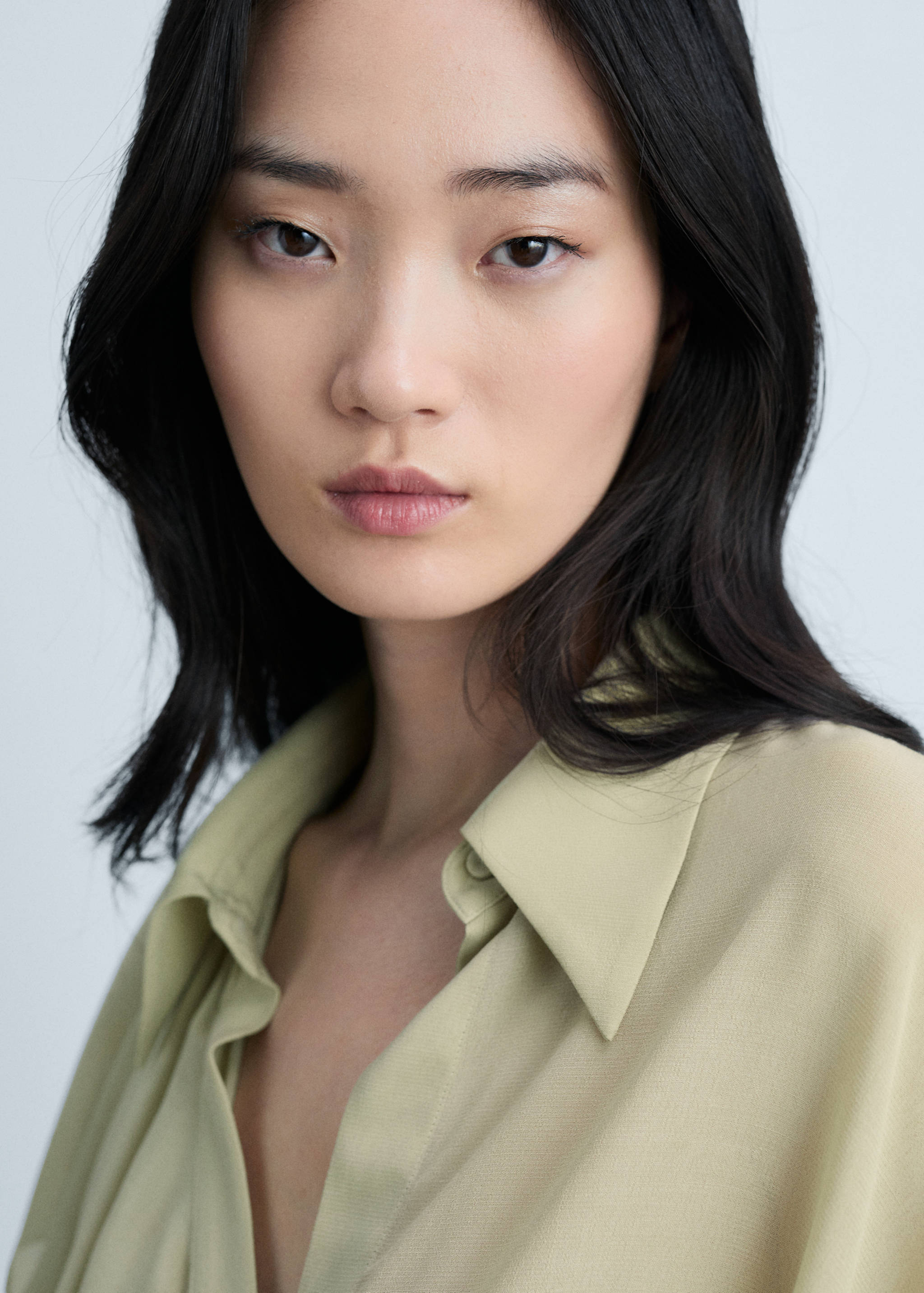 Shirt with ruffles and crossover fastening - Details of the article 1