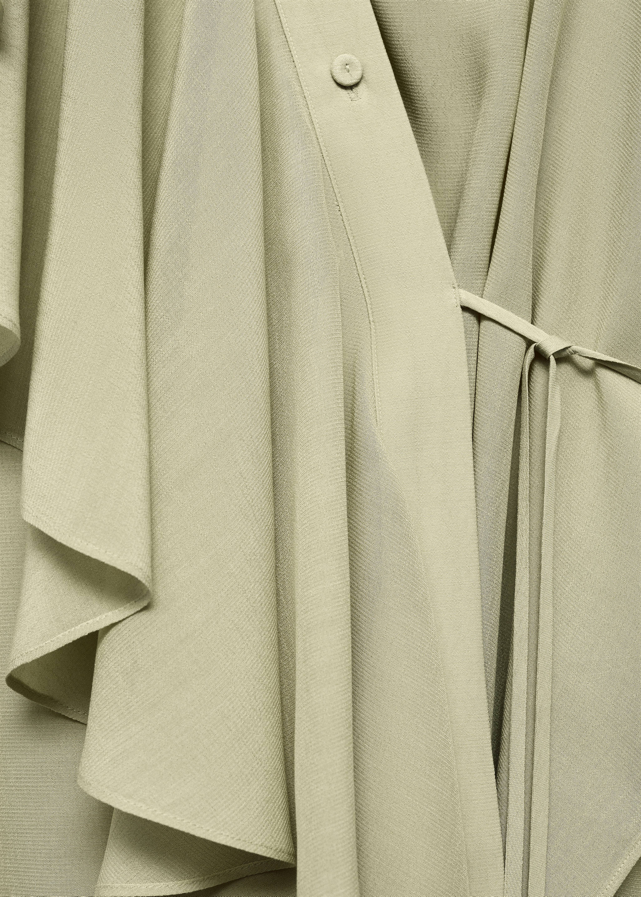 Shirt with ruffles and crossover fastening - Details of the article 8