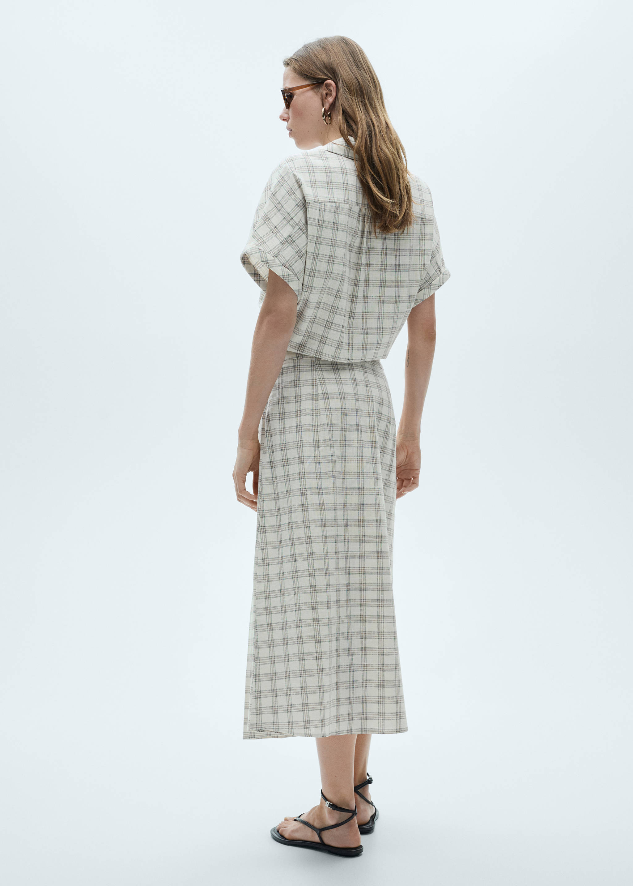 Rozkloszowana spódnica w kratkę - Tylna strona artykułu