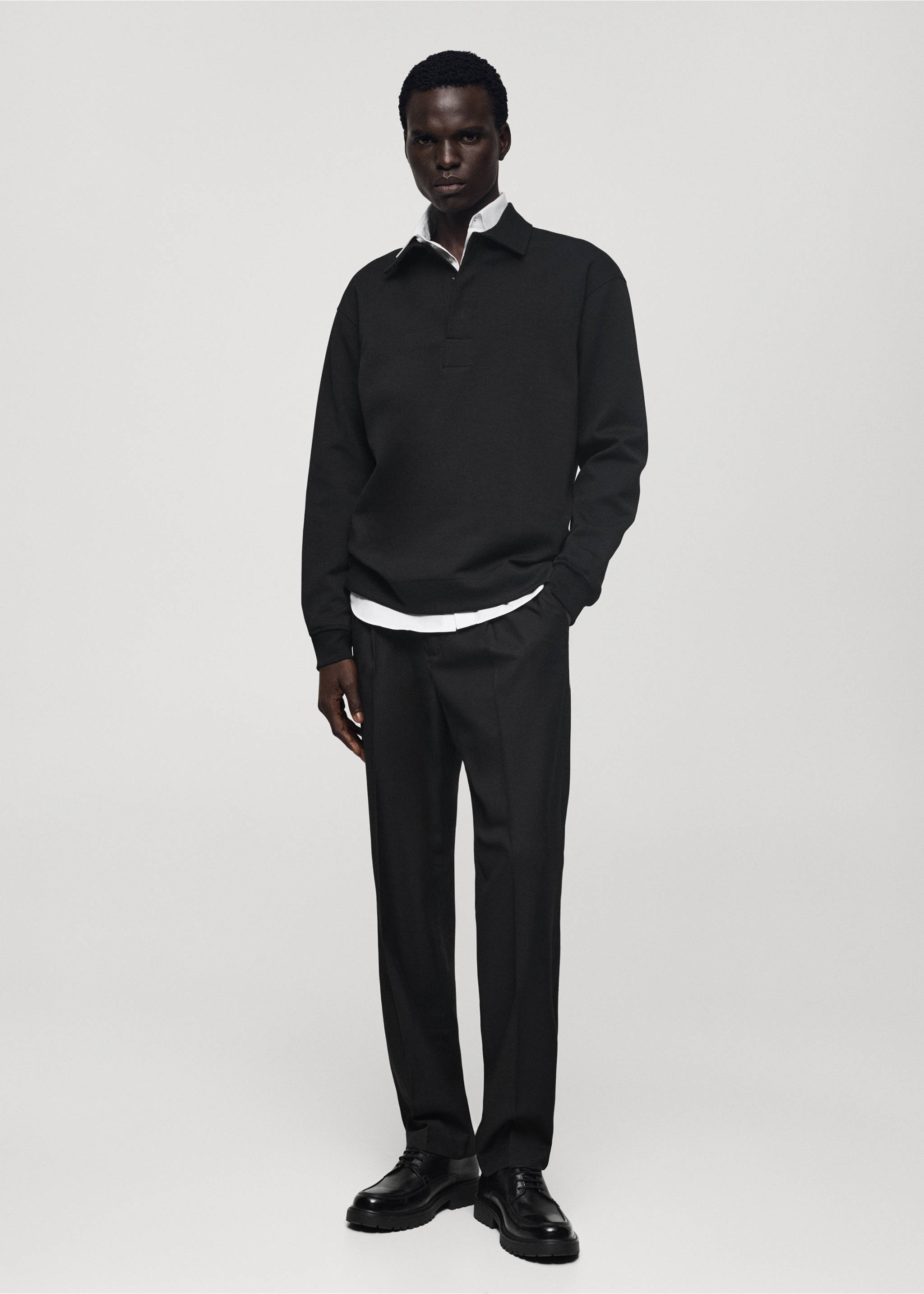 Relaxed-fit cotton polo - General plane, Black. Ref: 77077111-00.