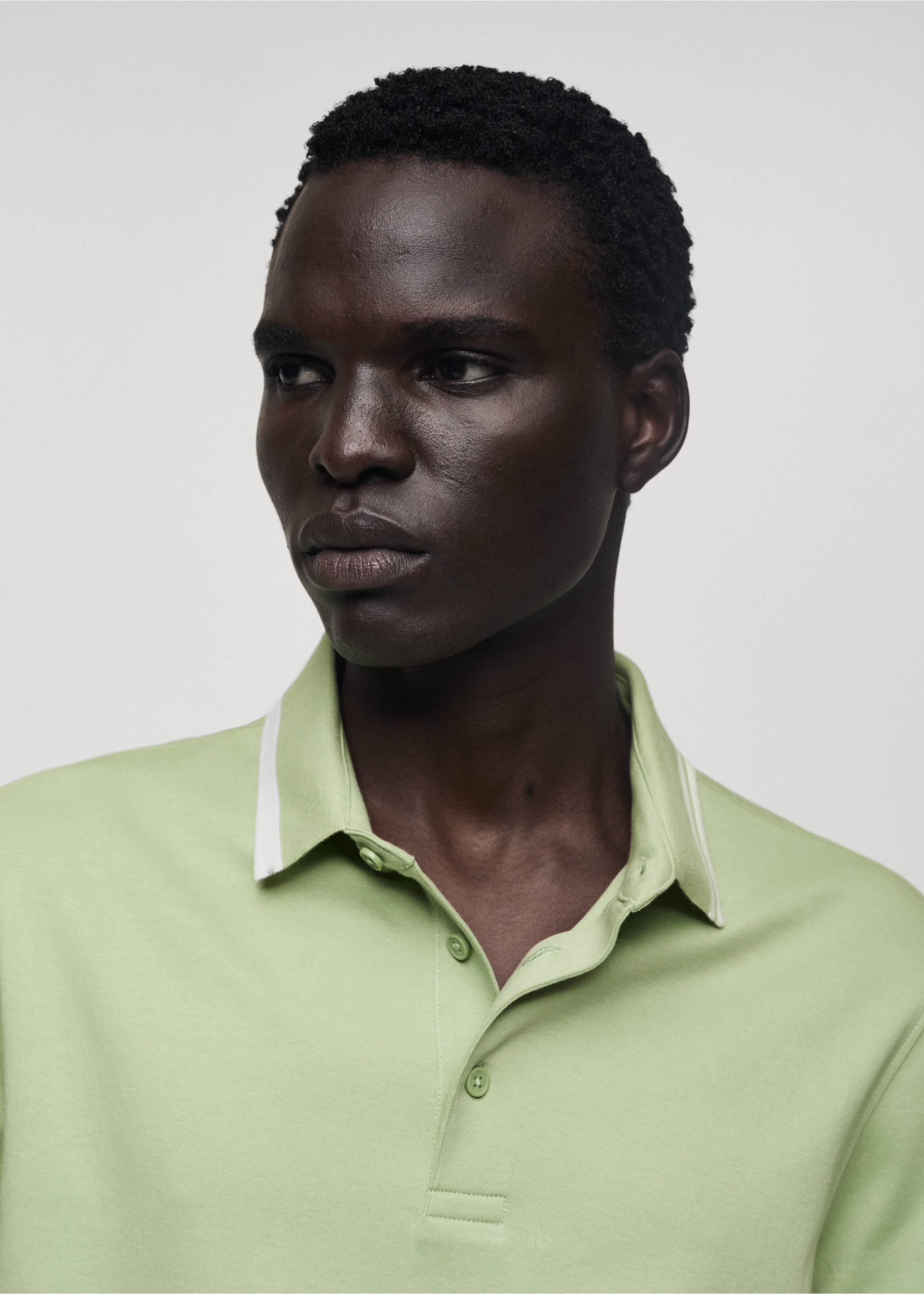 100% cotton polo shirt with contrast piping - Details of the article 1, Pastel Green. Ref: 77077681-00.