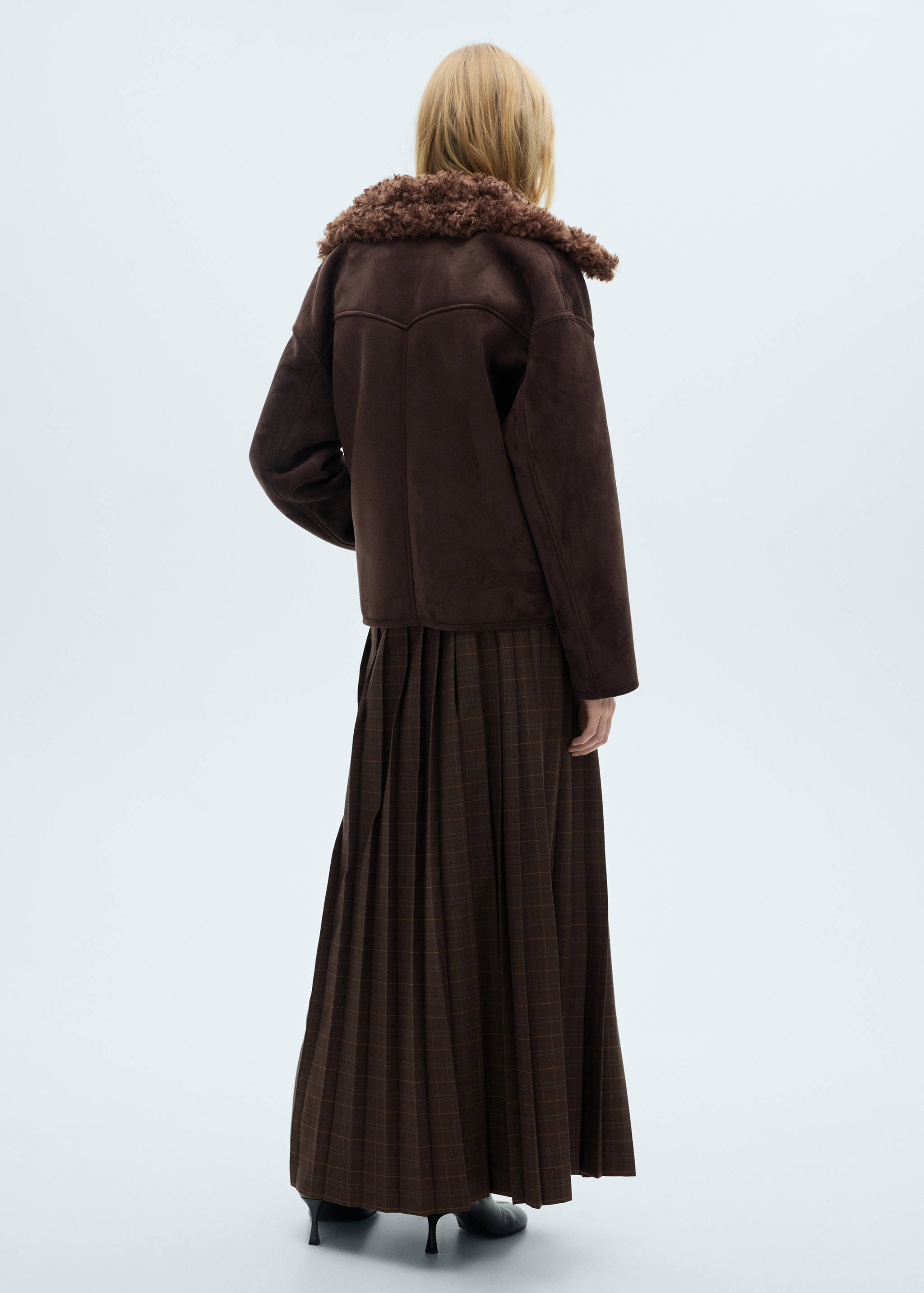 Pleated check skirt - Reverse of the article