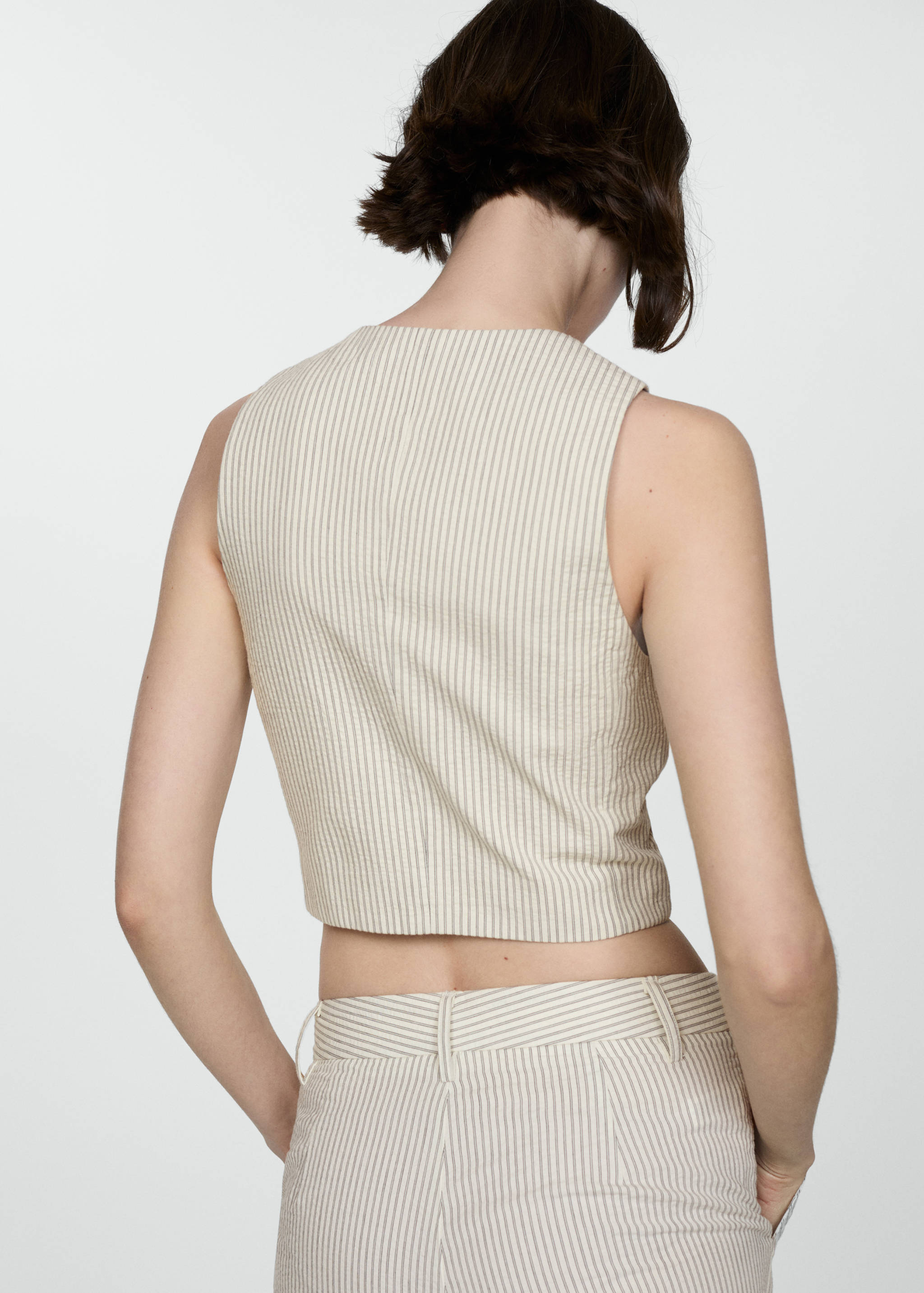 Kamizelka w paski - Tylna strona artykułu