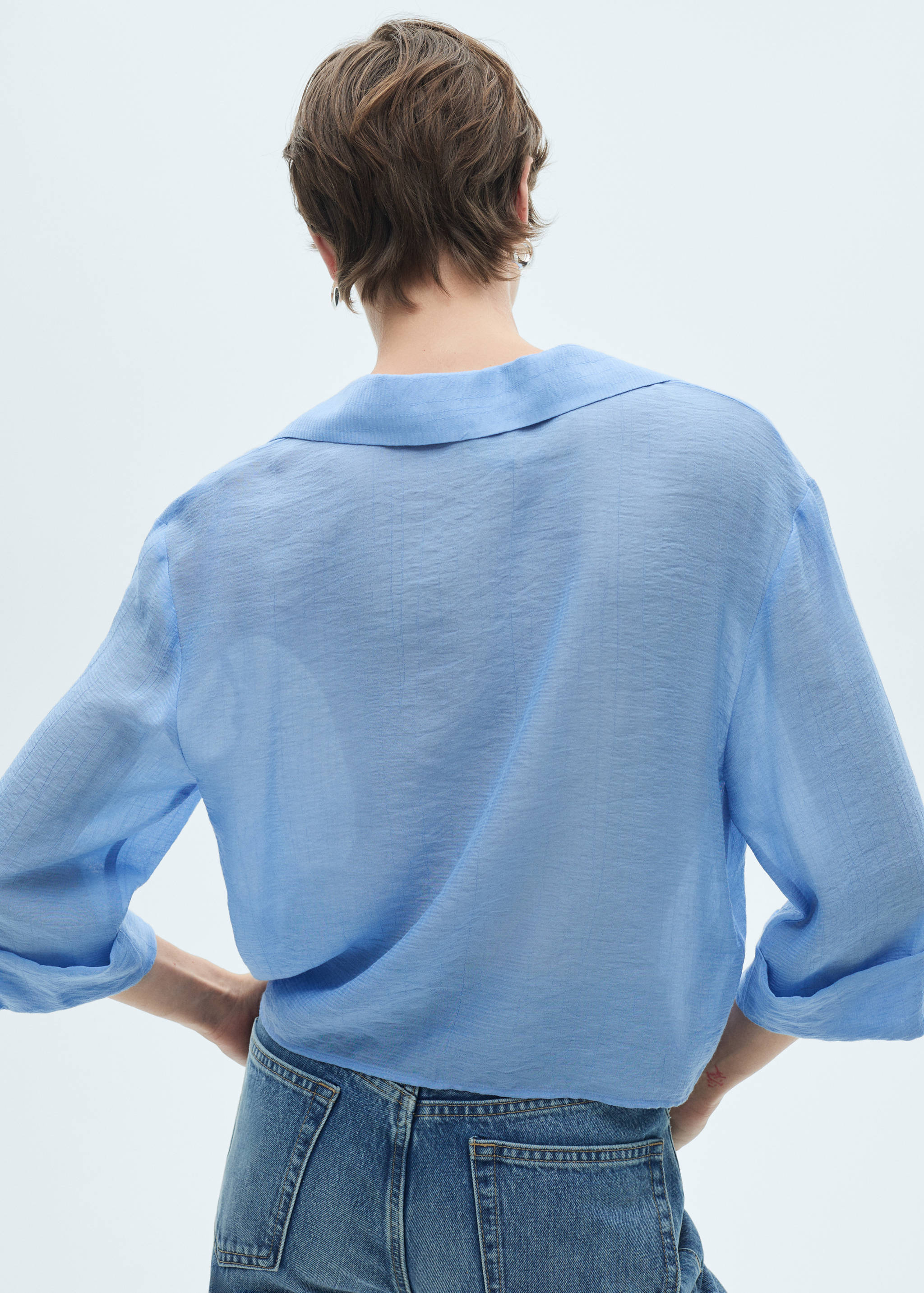 Flared-sleeve blouse with bow - Reverse of the article