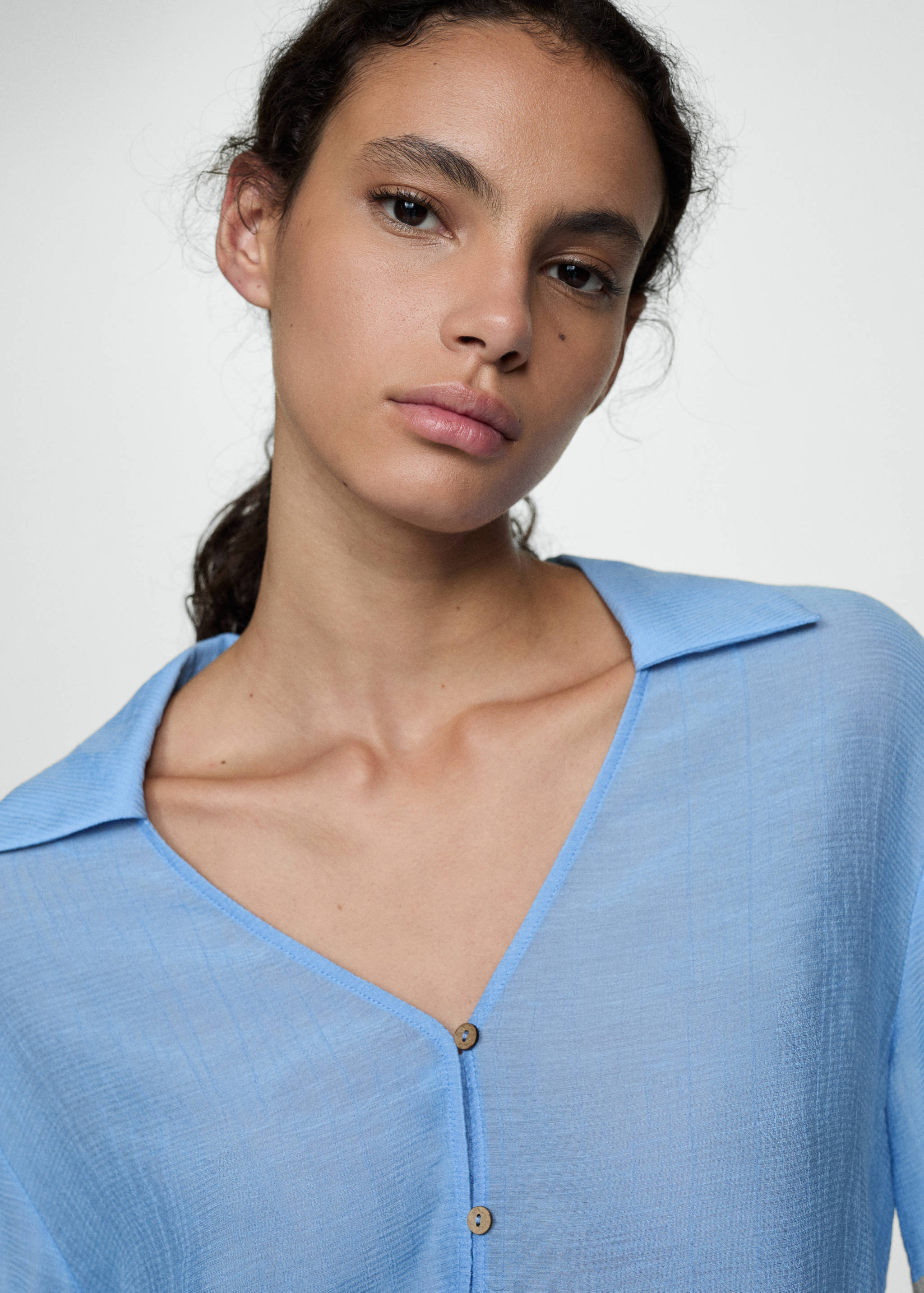 Flared-sleeve blouse with bow - Details of the article 1