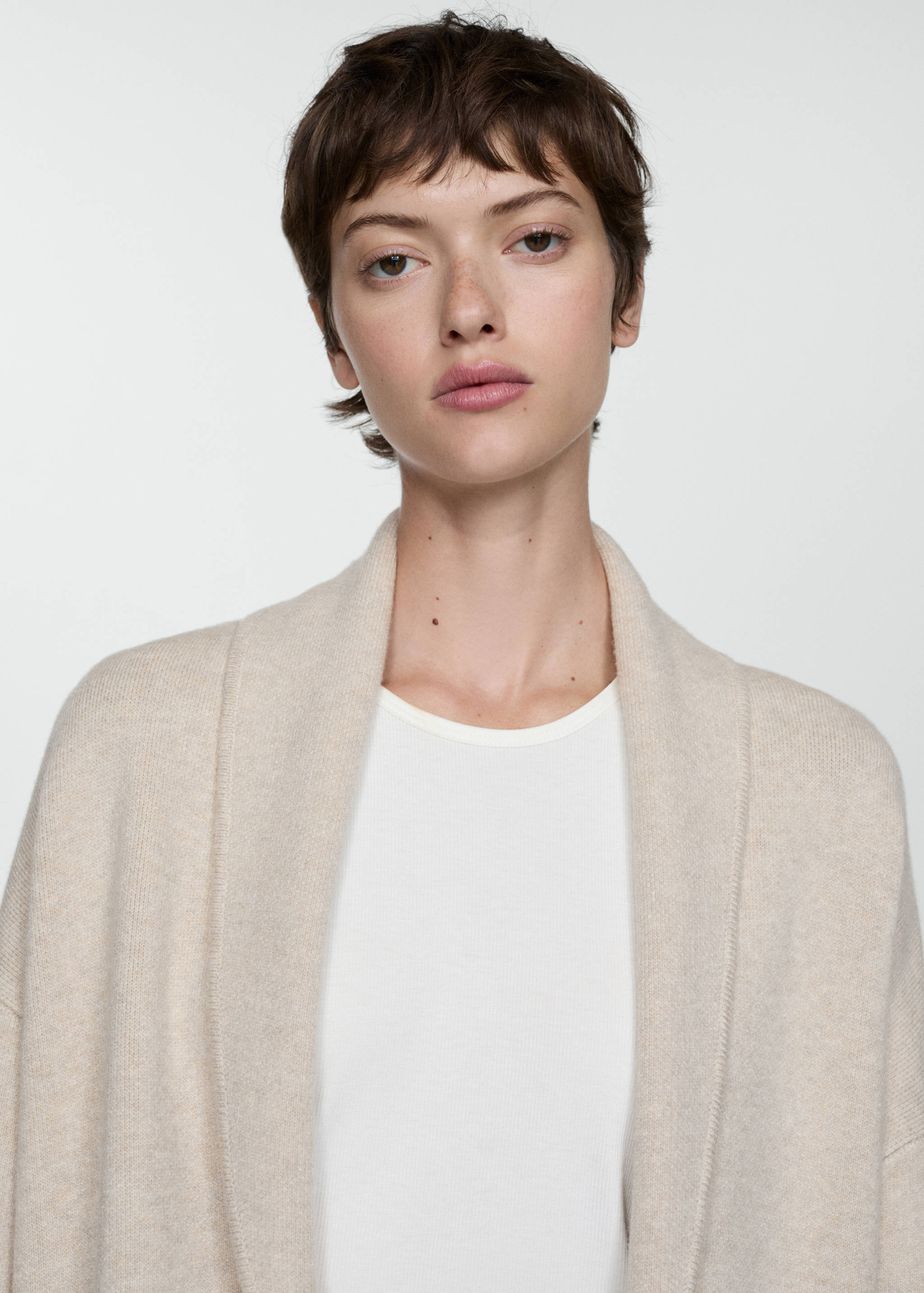 Oversized knitted coat with pockets - Details of the article 1