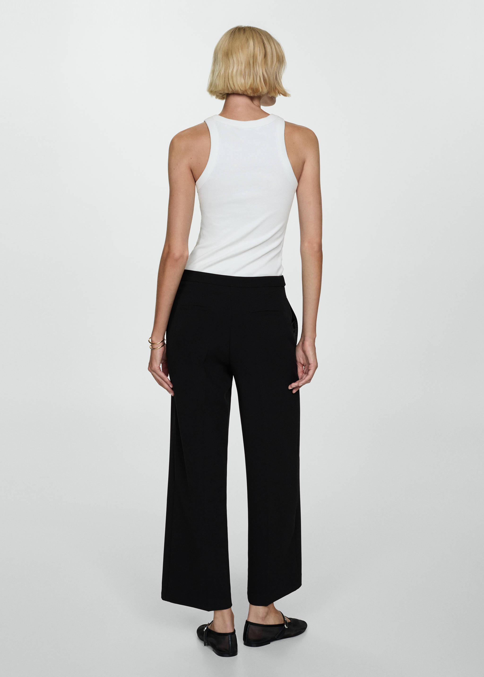 Raka byxor knappar - Artikelns baksida