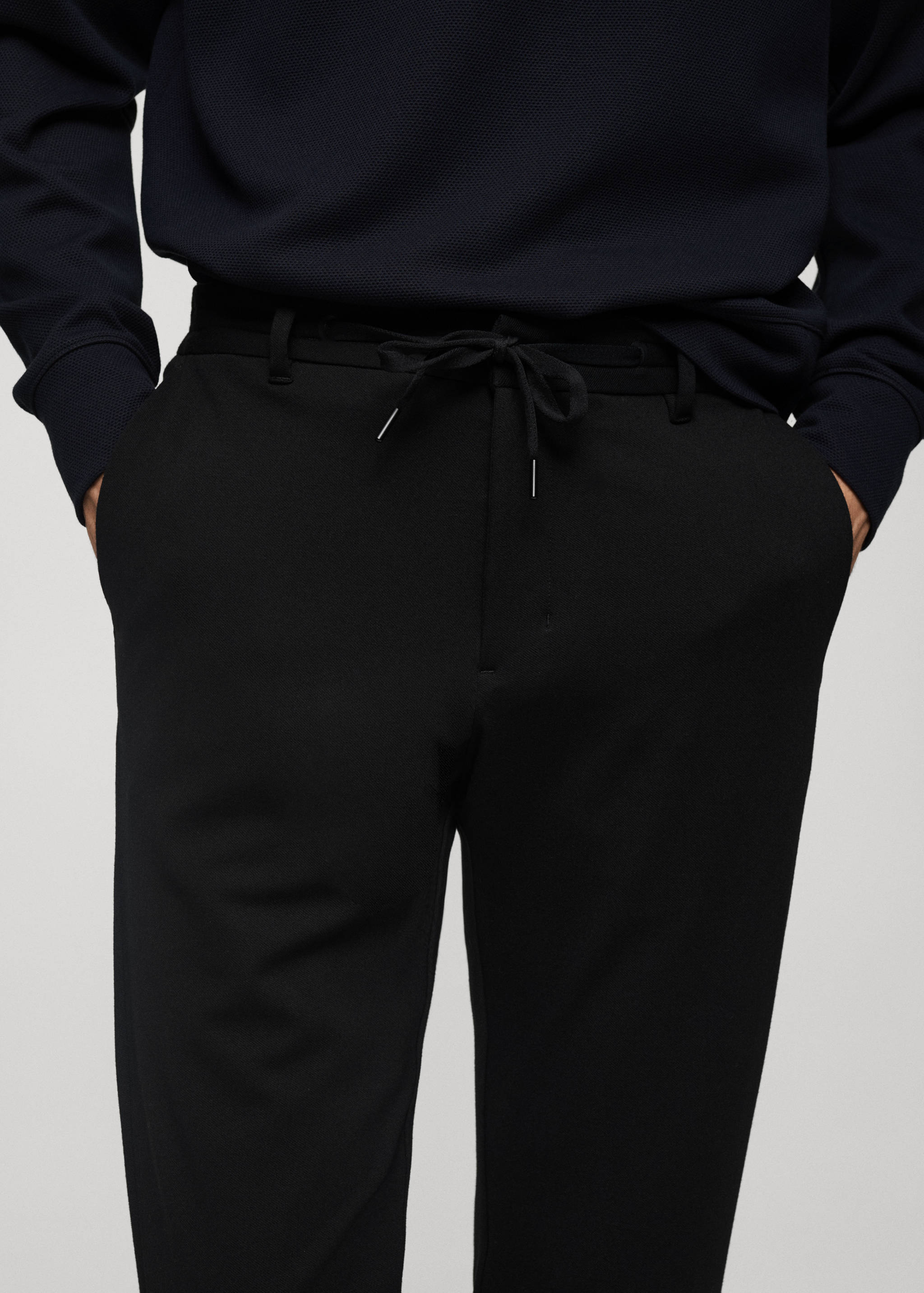 Stretch fabric slim-fit trousers with drawstring - Details of the article 1