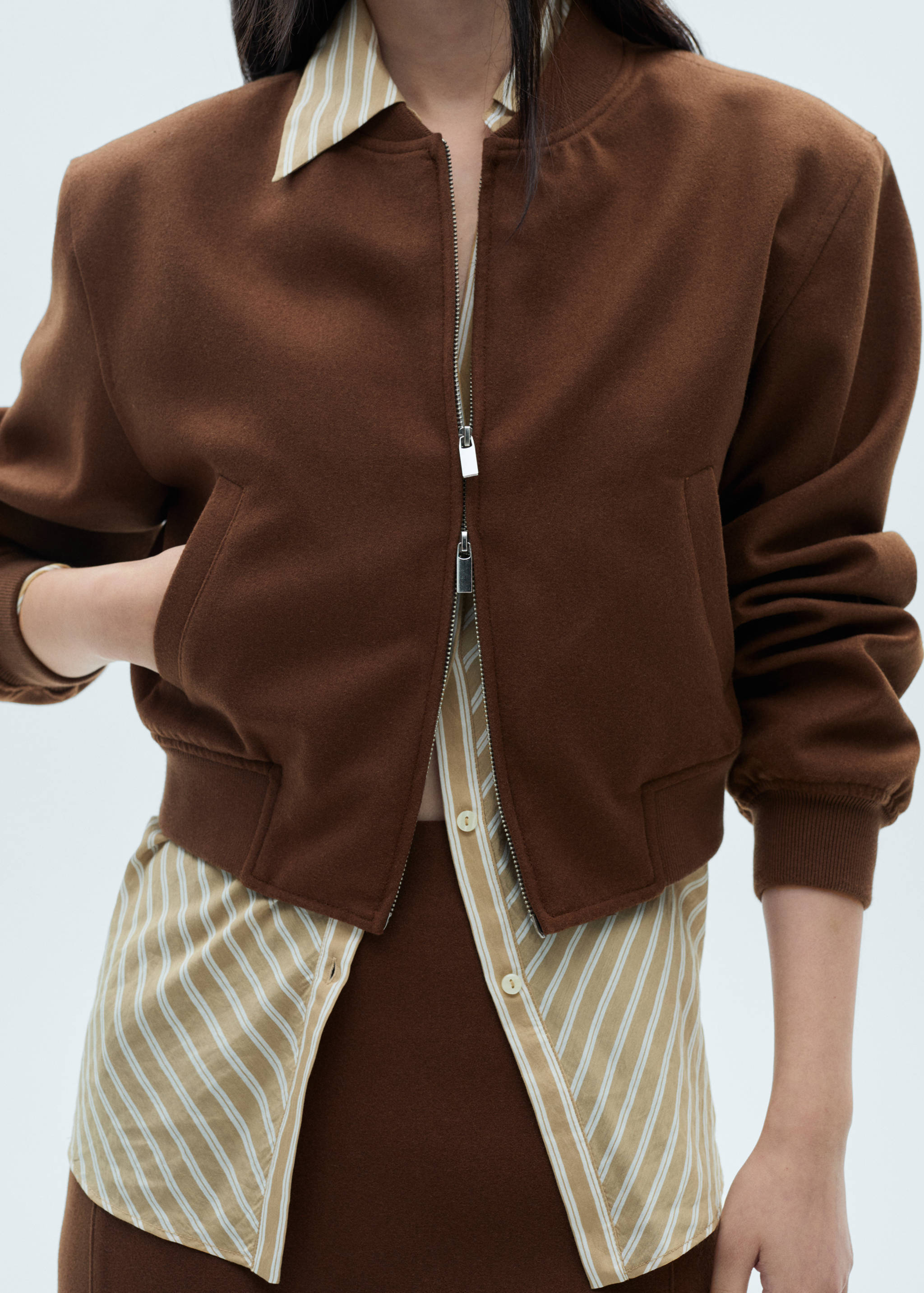 Wollen bomberjack - Detail van het artikel 6