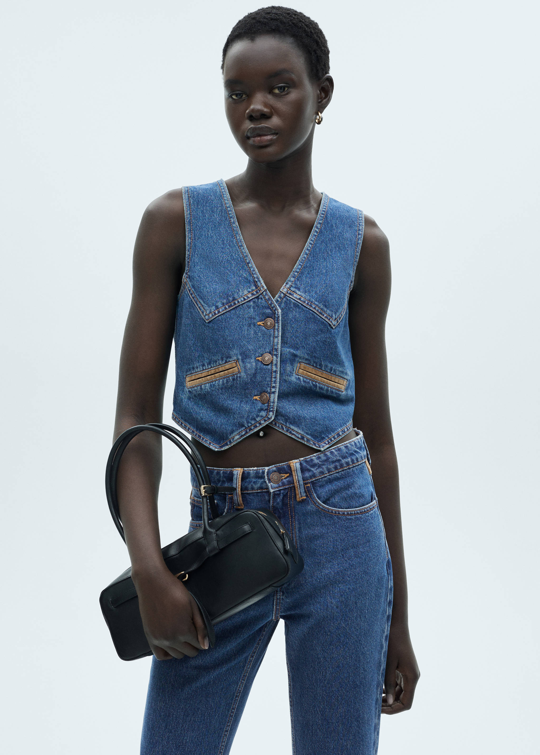 Denim vest with contrast details - Medium plane