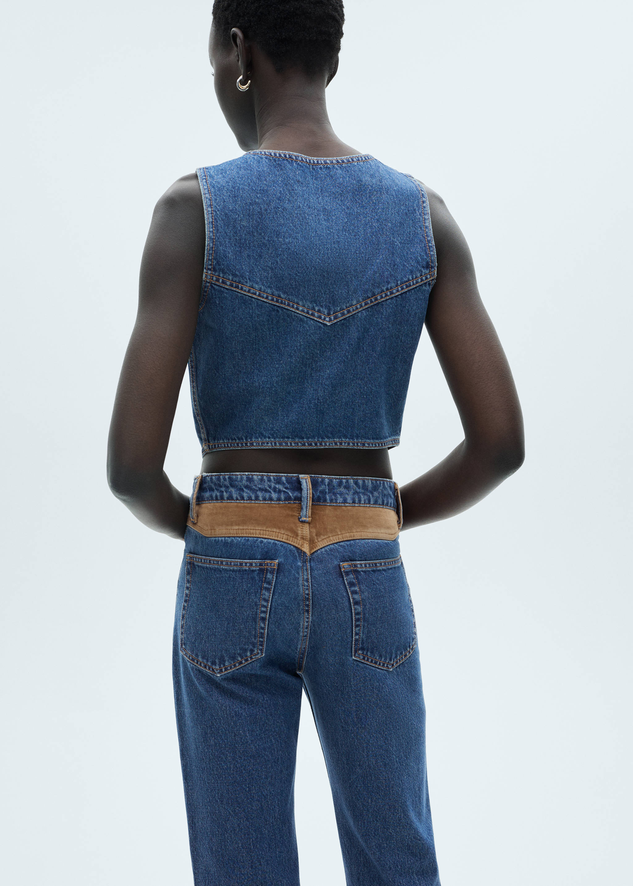 Denim vest with contrast details - Reverse of the article